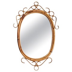 Italian Oval Burnt Bamboo Rattan Scrolled Tortoise Mirror After Franco Albini