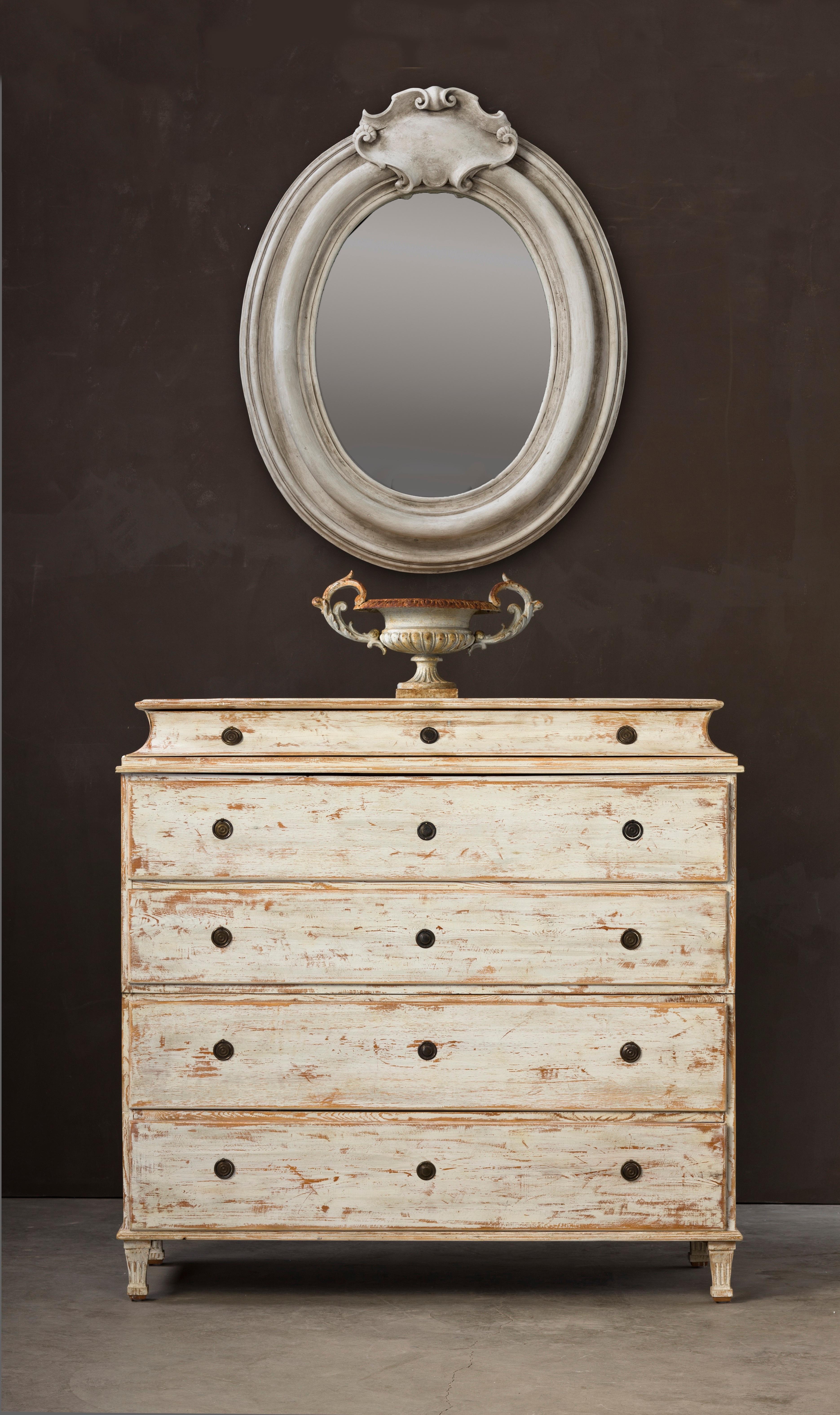 Tara Shaw Maison Italian oval plaster mirror with cartouche. Perfect for vanity, powder room, fireplace or over a console.