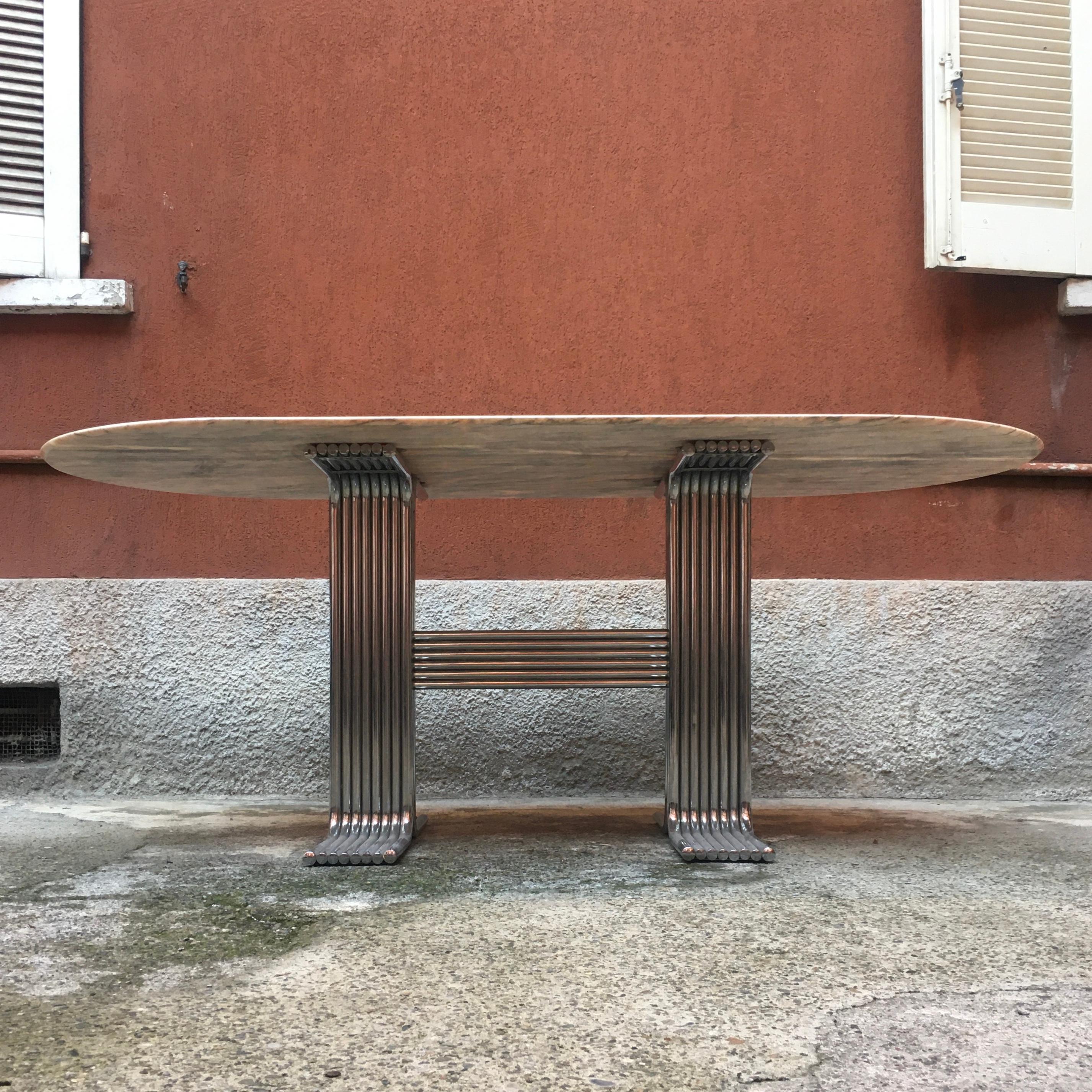 Italian oval marble dining table, 1970s
Oval marble dining table with solid base formed by parallel chromed steel tubes
Fully restored.