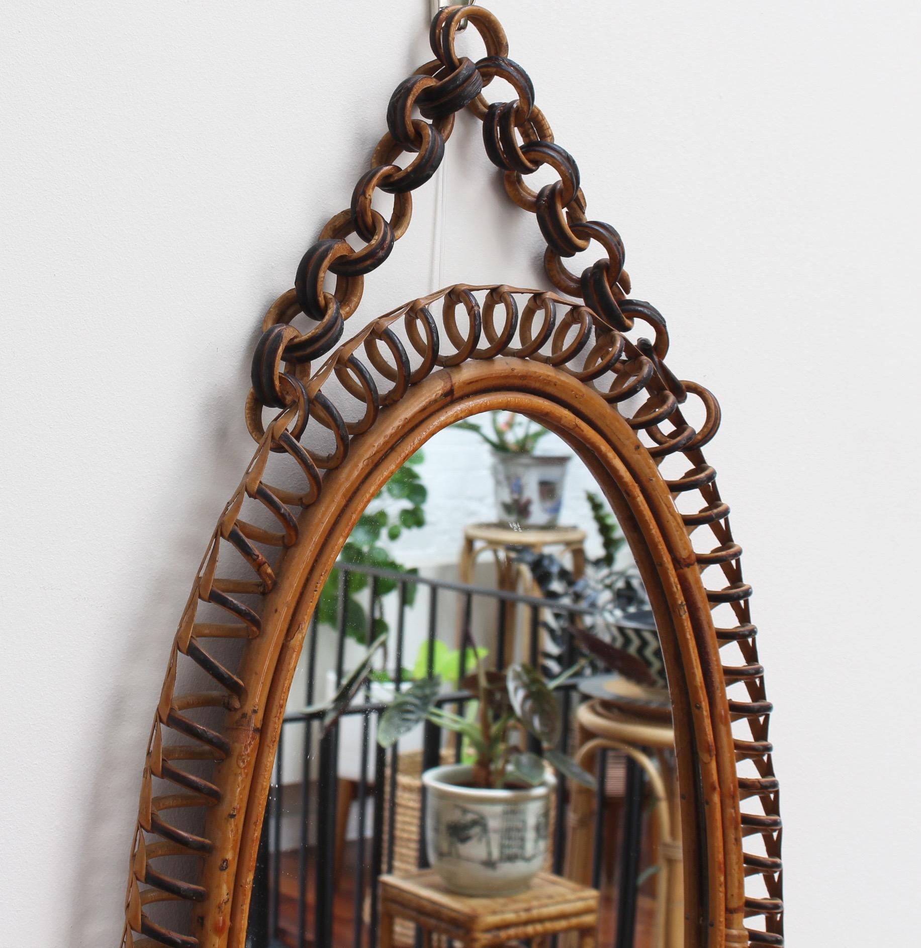 Italian Oval-Shaped Rattan Wall Mirror with Hanging Chain 'circa 1960s' In Good Condition In London, GB