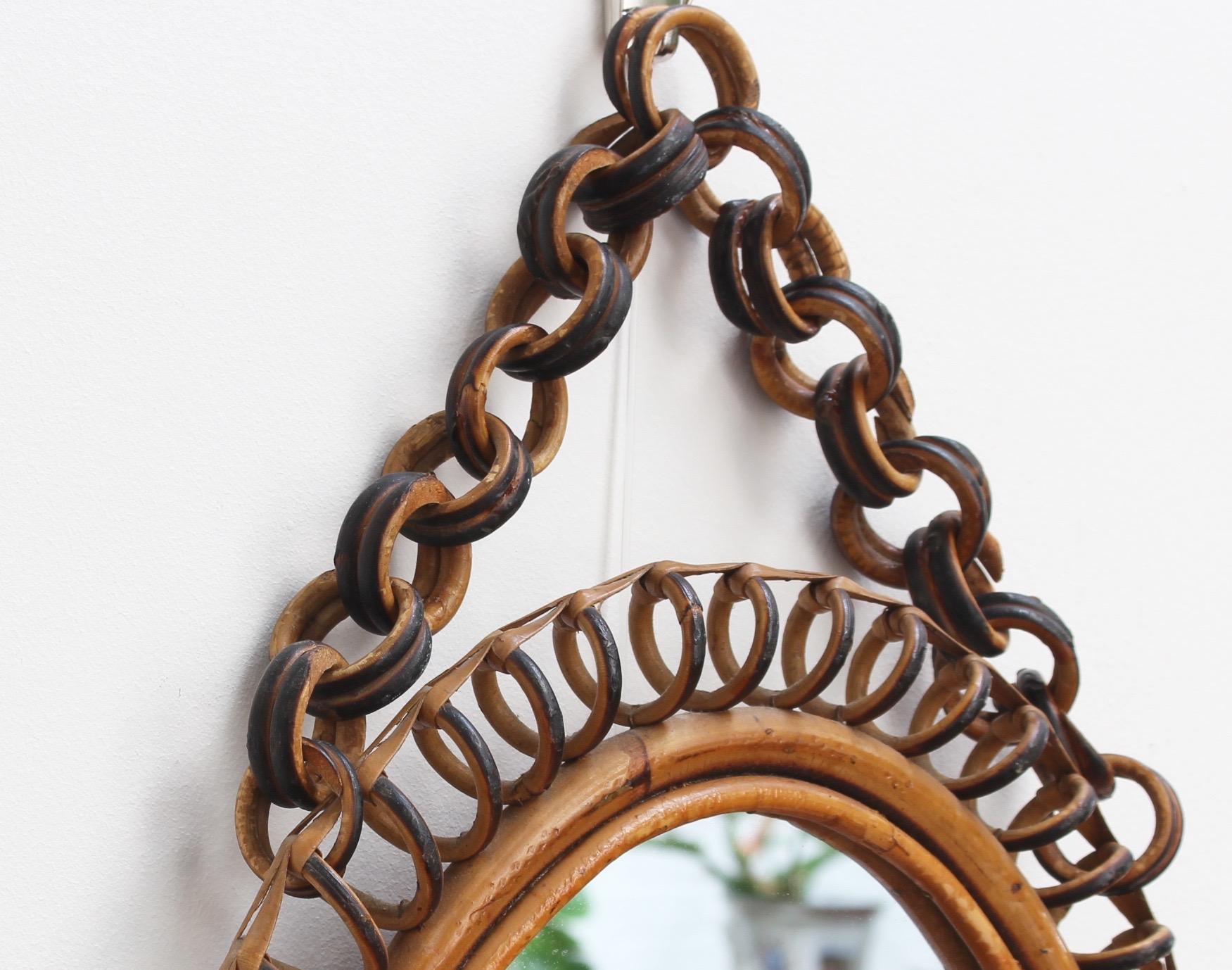 Mid-20th Century Italian Oval-Shaped Rattan Wall Mirror with Hanging Chain 'circa 1960s'