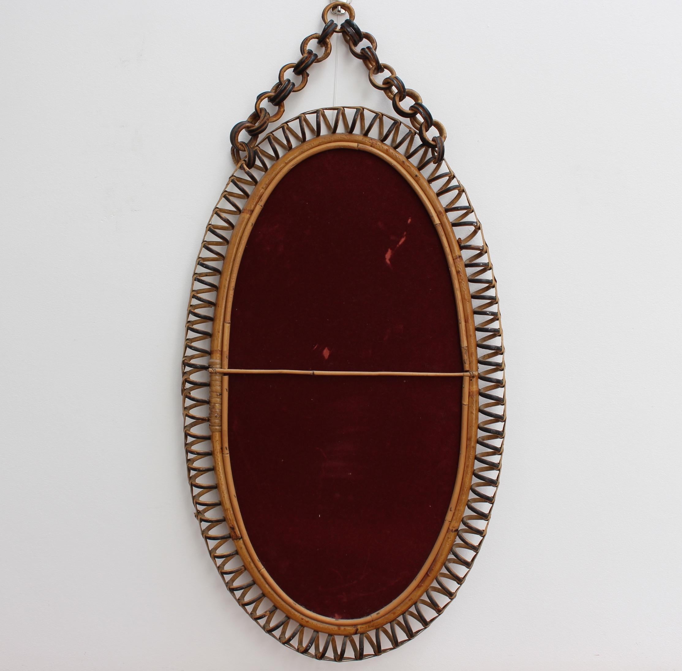Italian Oval-Shaped Rattan Wall Mirror with Hanging Chain 'circa 1960s' 1
