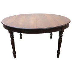 Used Italian Oval Table in Solid Walnut with Turned Leg  Very Comfortable