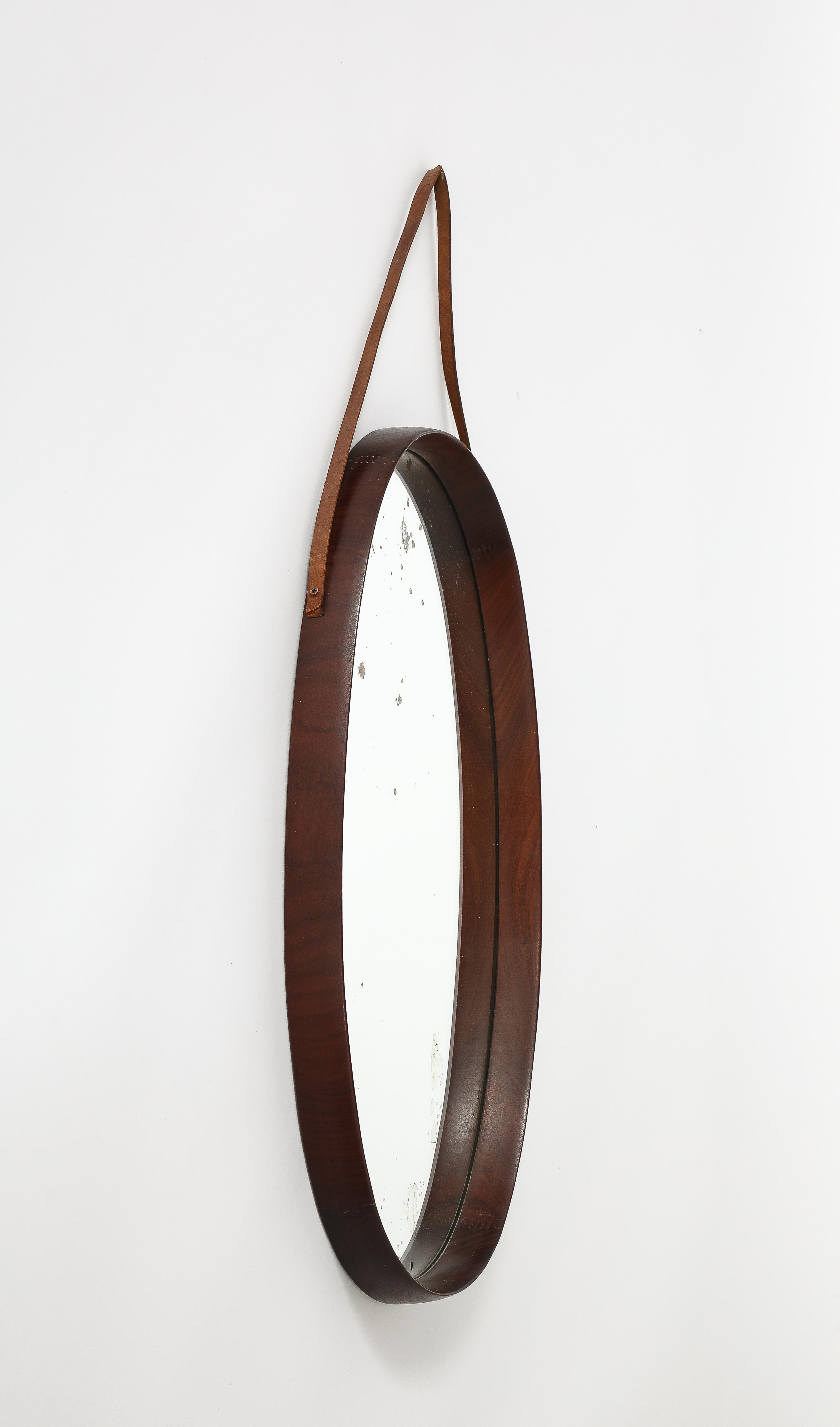 Mid-Century Modern Italian Oval Teak Wall Mirror with Leather Strap, Italy, circa 1950  For Sale
