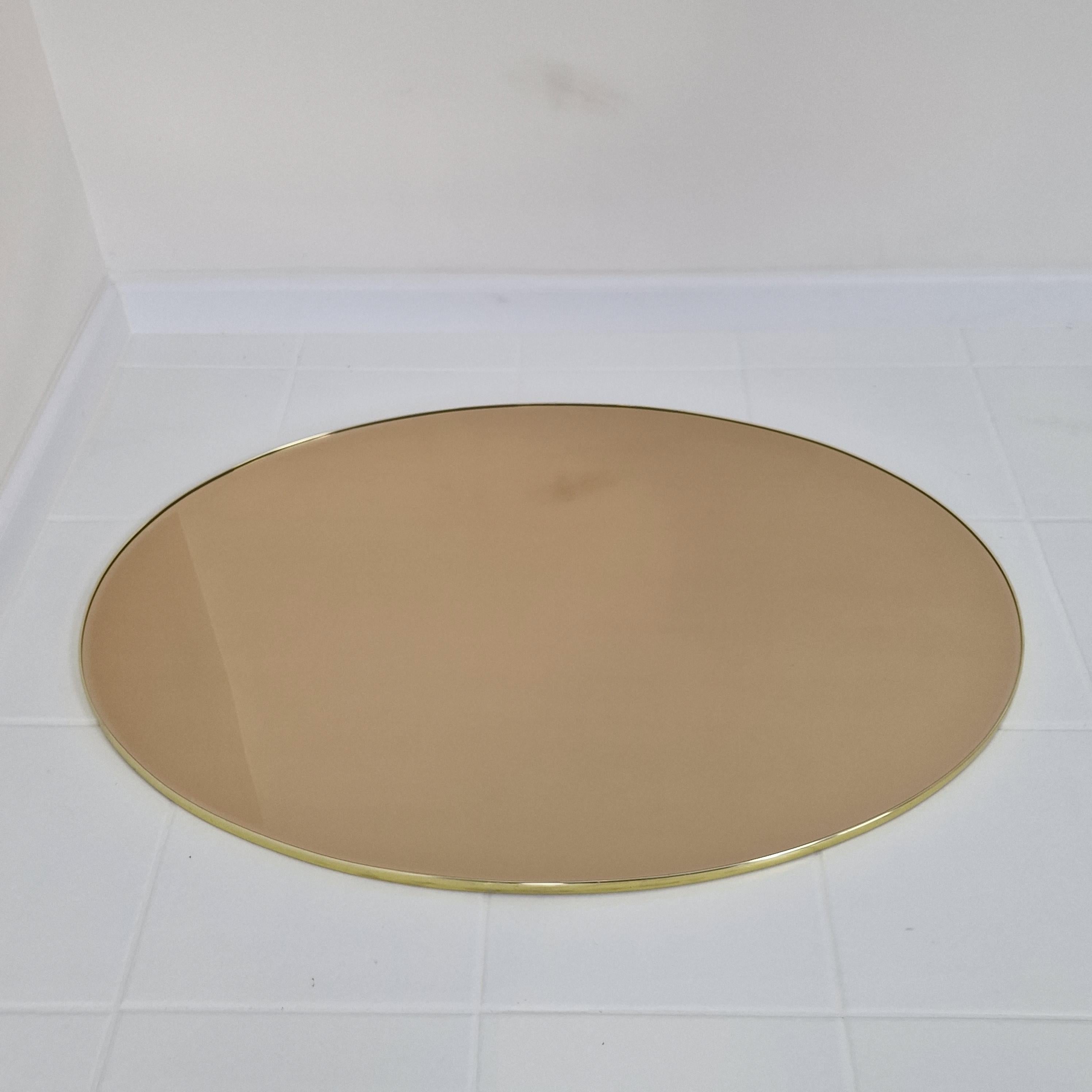Mid-Century Modern Italian Oval Wall Mirror with Smoked facet Cut Glass and Brass Frame, 1970s For Sale