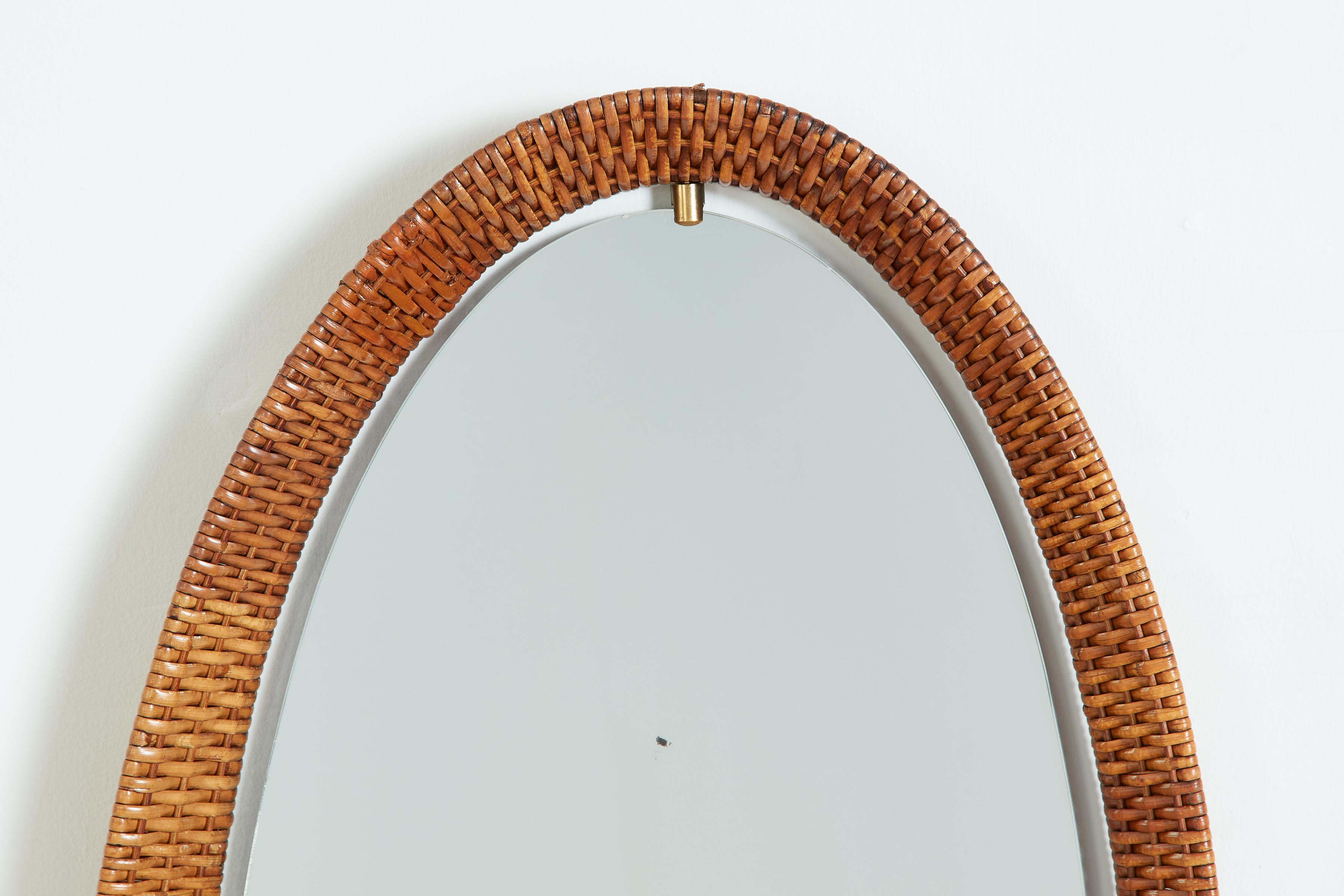 Milieu du XXe siècle Miroir ovale en osier italien en vente