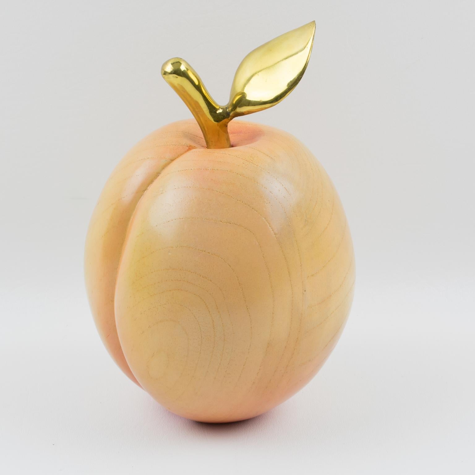 This stunning 1980s Italian decorative wood sculpture features an oversized carved peach with a brass stem and leaf. There is no visible maker's mark.
Measurements: 6 in diameter (15 cm) x 9 in high (23 cm).