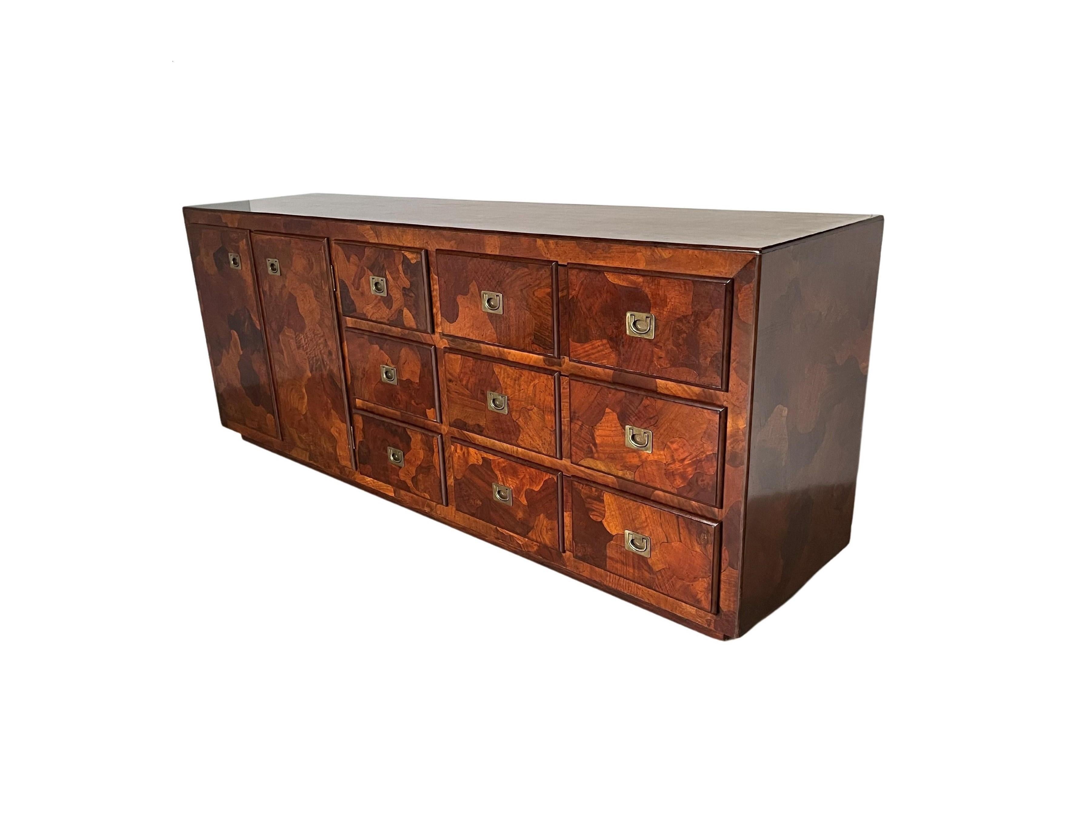 Truly visually enticing Italian crafted dresser. This piece features the most magnificent patchwork design with beautifully rendered 