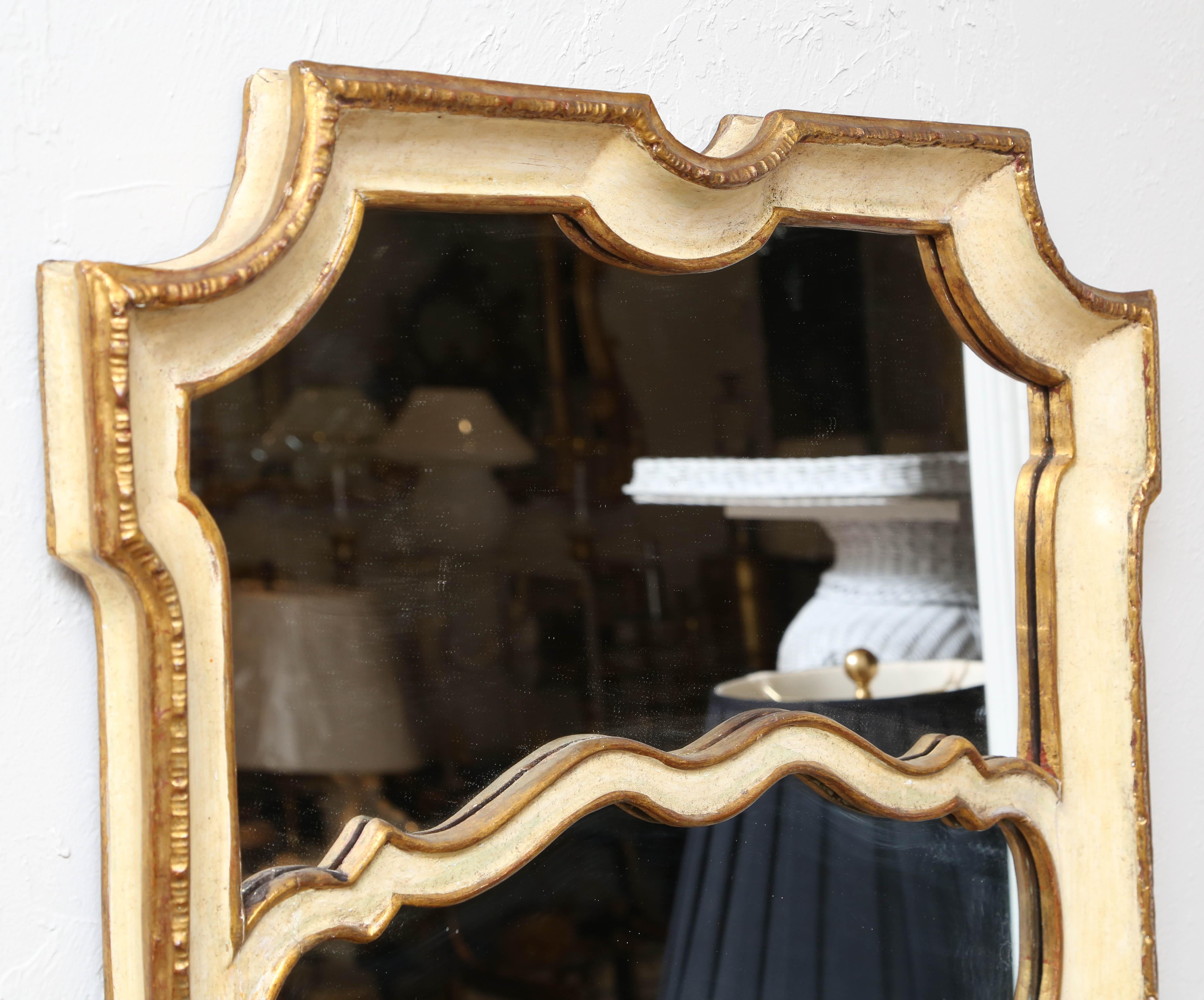 Vintage cream and gold painted wood mirror by Palladio.