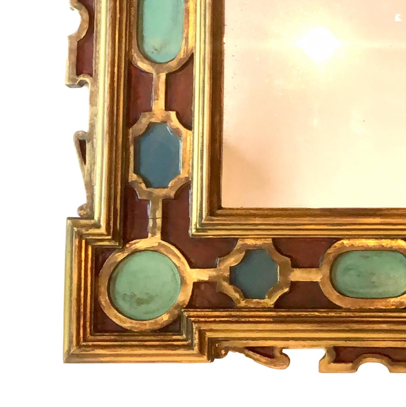 A circa 1920's Italian gilt mirror with a painted frame. 

Measurements:
Height: 32