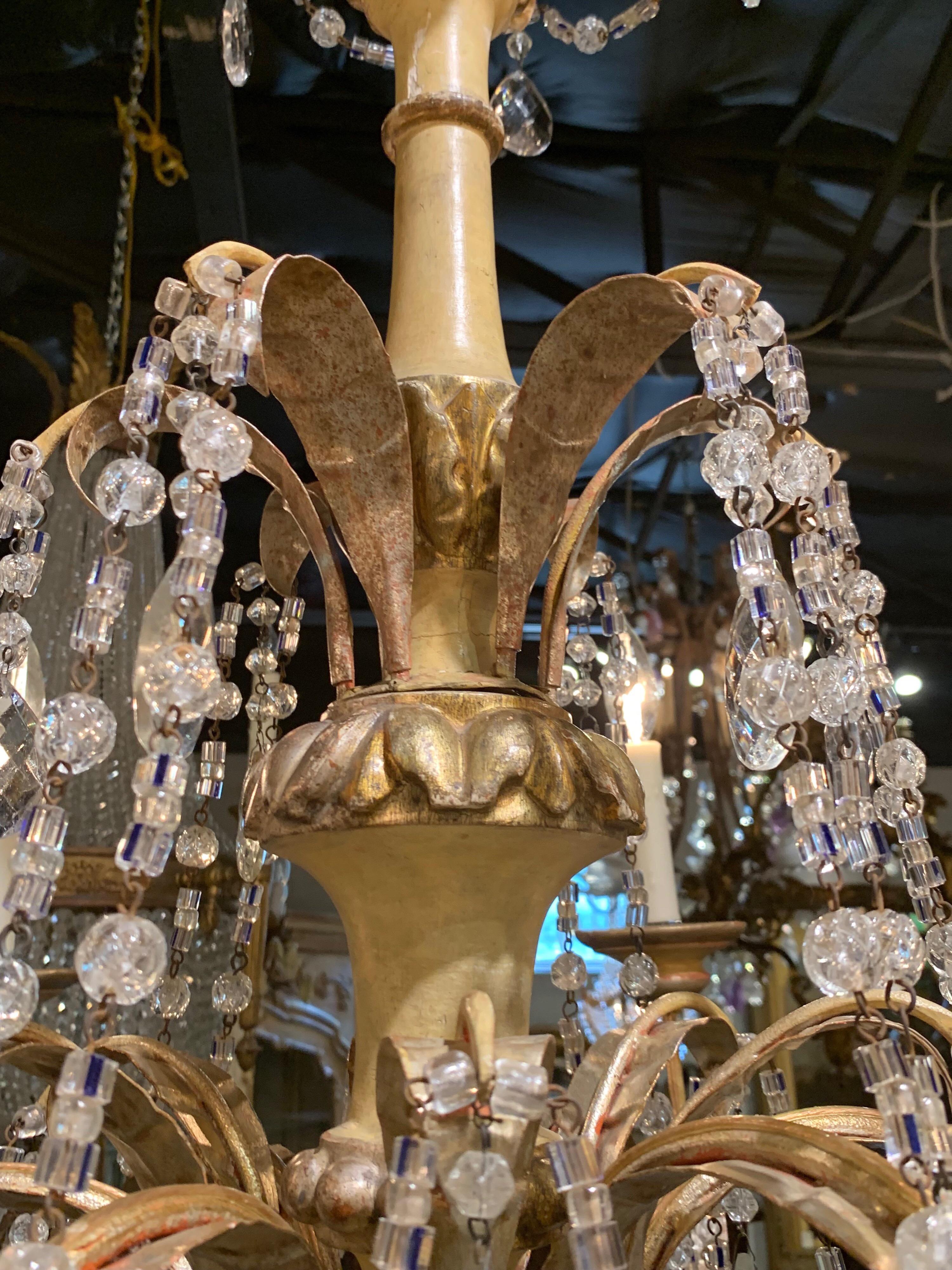 Early 20th century Italian painted and giltwood chandelier. This fixture has 6 lights and beaded swags. Light and airy appearance. Very pretty! Comes with a canopy and chain. Ready to hang.