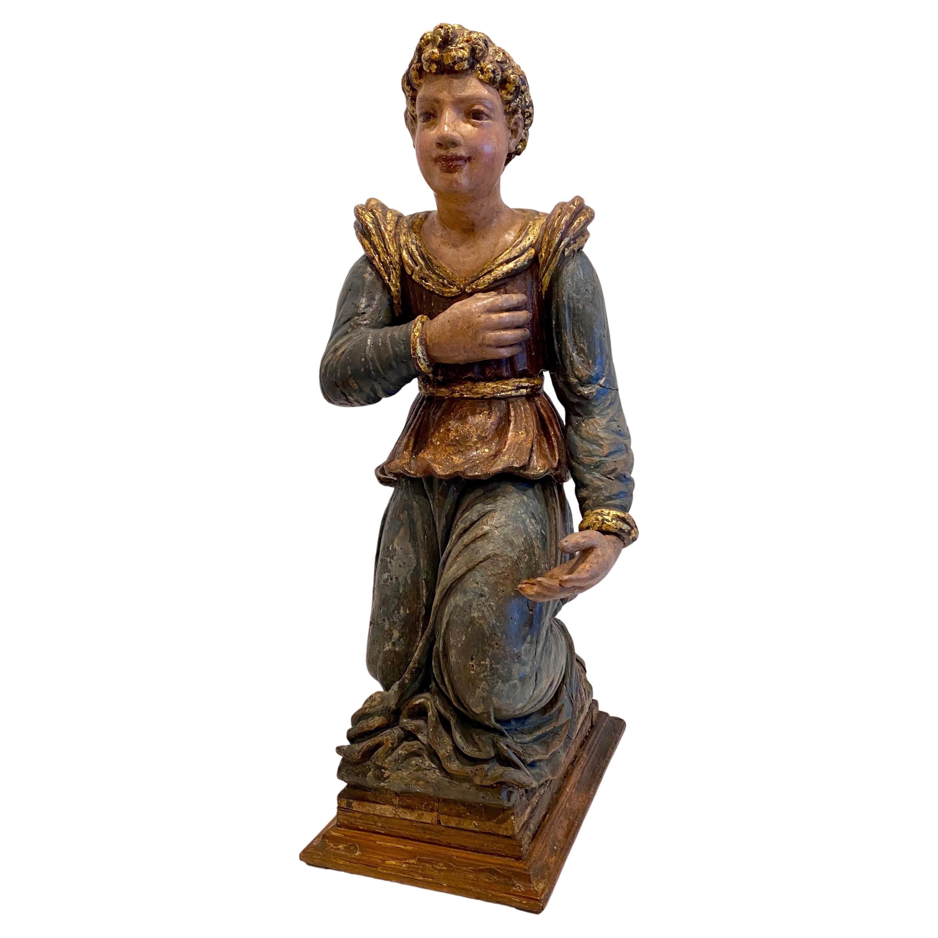 Italian Painted and Lacquered Wooden Sculpture of a Kneeling Figure, Circa 1650 For Sale