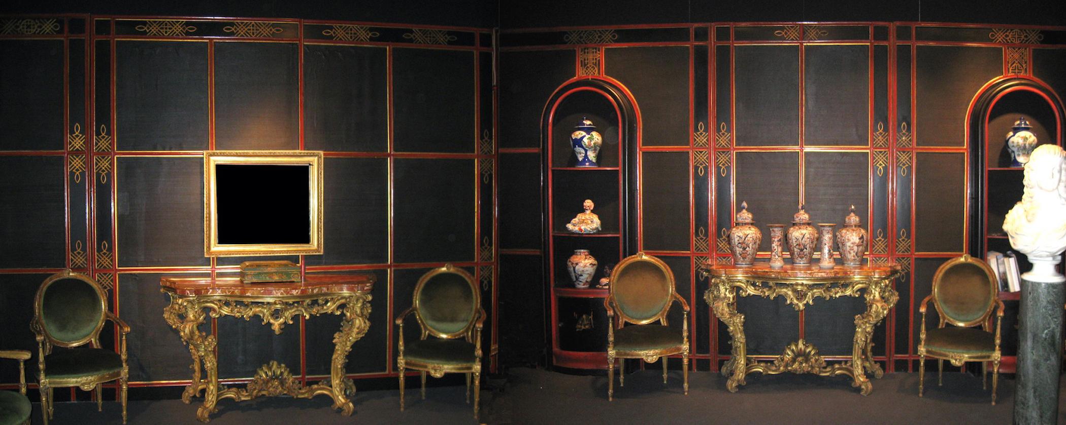 A very fine early 20th century Italian “japoneserie” painted and parcel-gilt Boiserie panels with a black painted canvas insert.
Modular panels create a complete room with an amazing door and a pair of fine book cases or cabinets.
Sophisticated