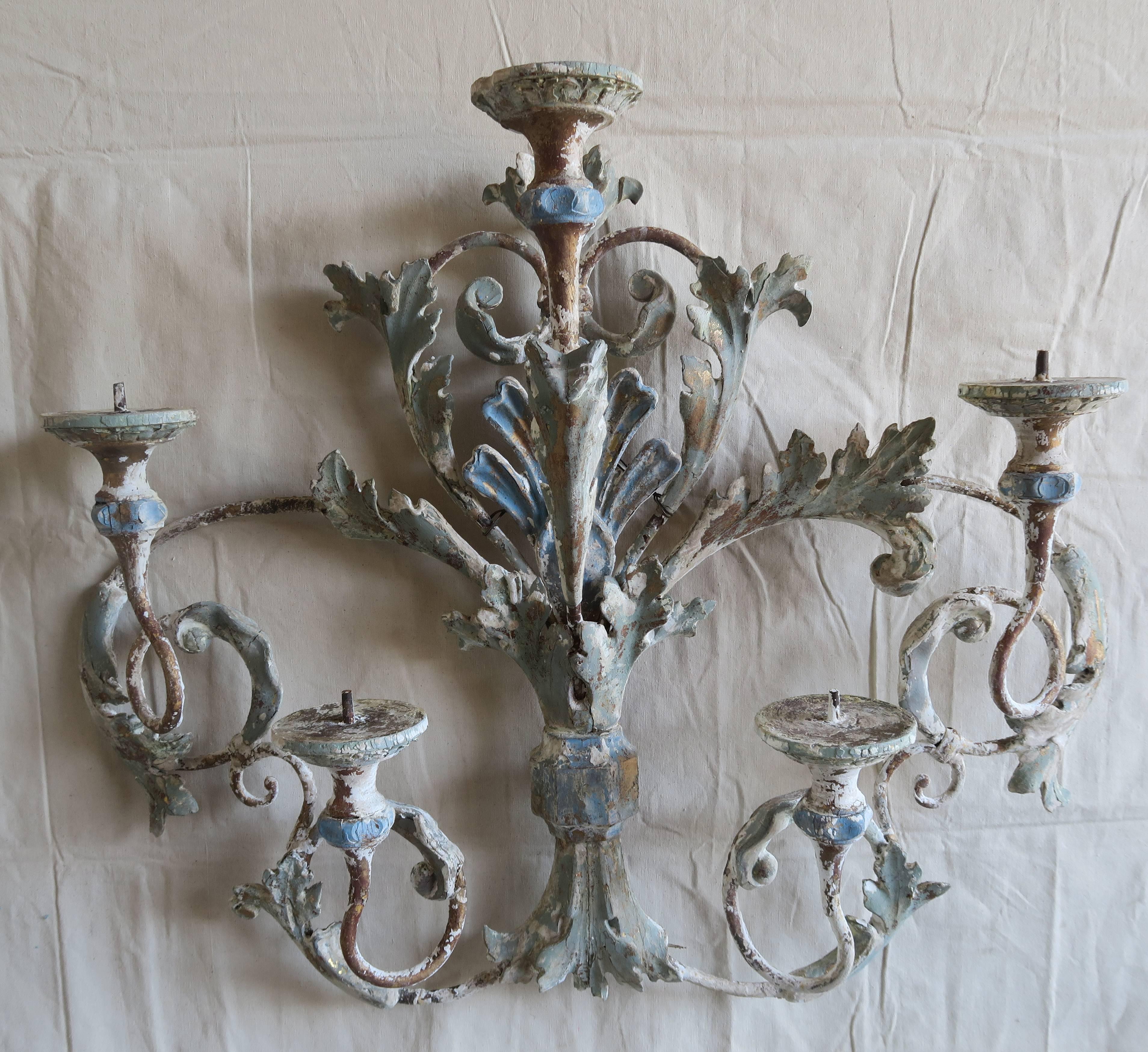Italian painted iron and wood acanthus leaf five-light wall sconce that can accommodate five candles or it can be wired for electricity.