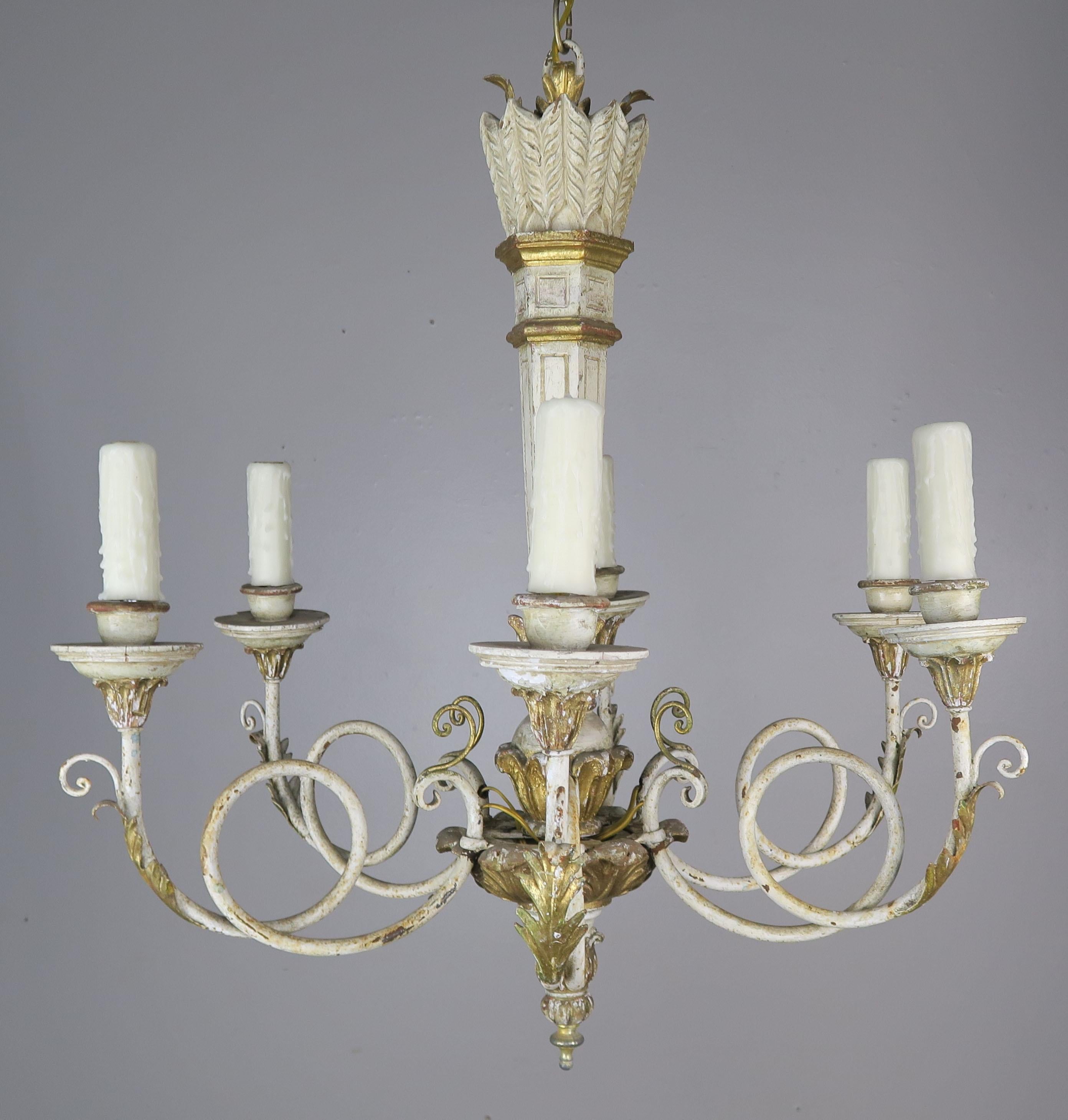 Six-light Italian hand painted and parcel giltwood and iron chandelier. The fixture is newly rewired with drip wax candle covers. Chain and canopy included.