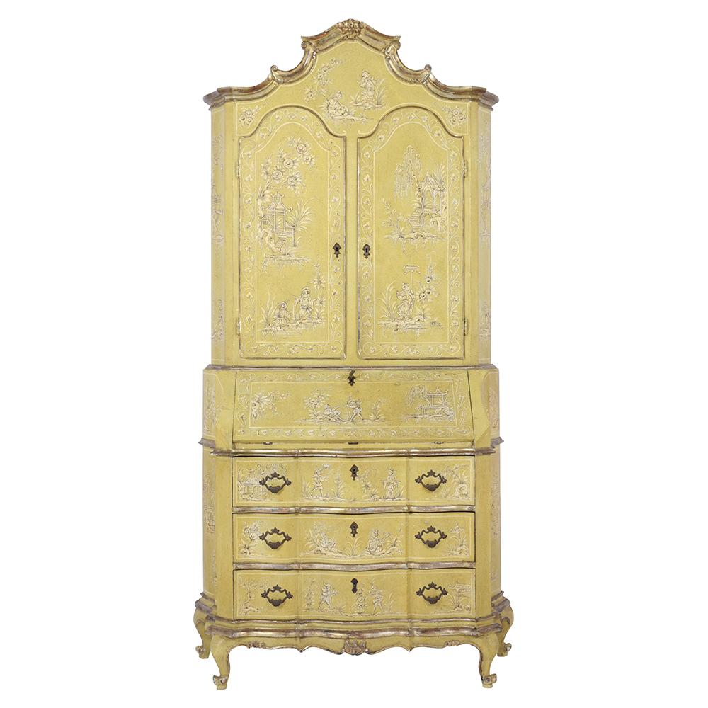 A remarkable early 20th-century Italian rococo-style secretaire is handcrafted out of maple wood and features its original intricate hand-painted design with silver leaf details throughout the entire piece. This bookcase top comes with two doors