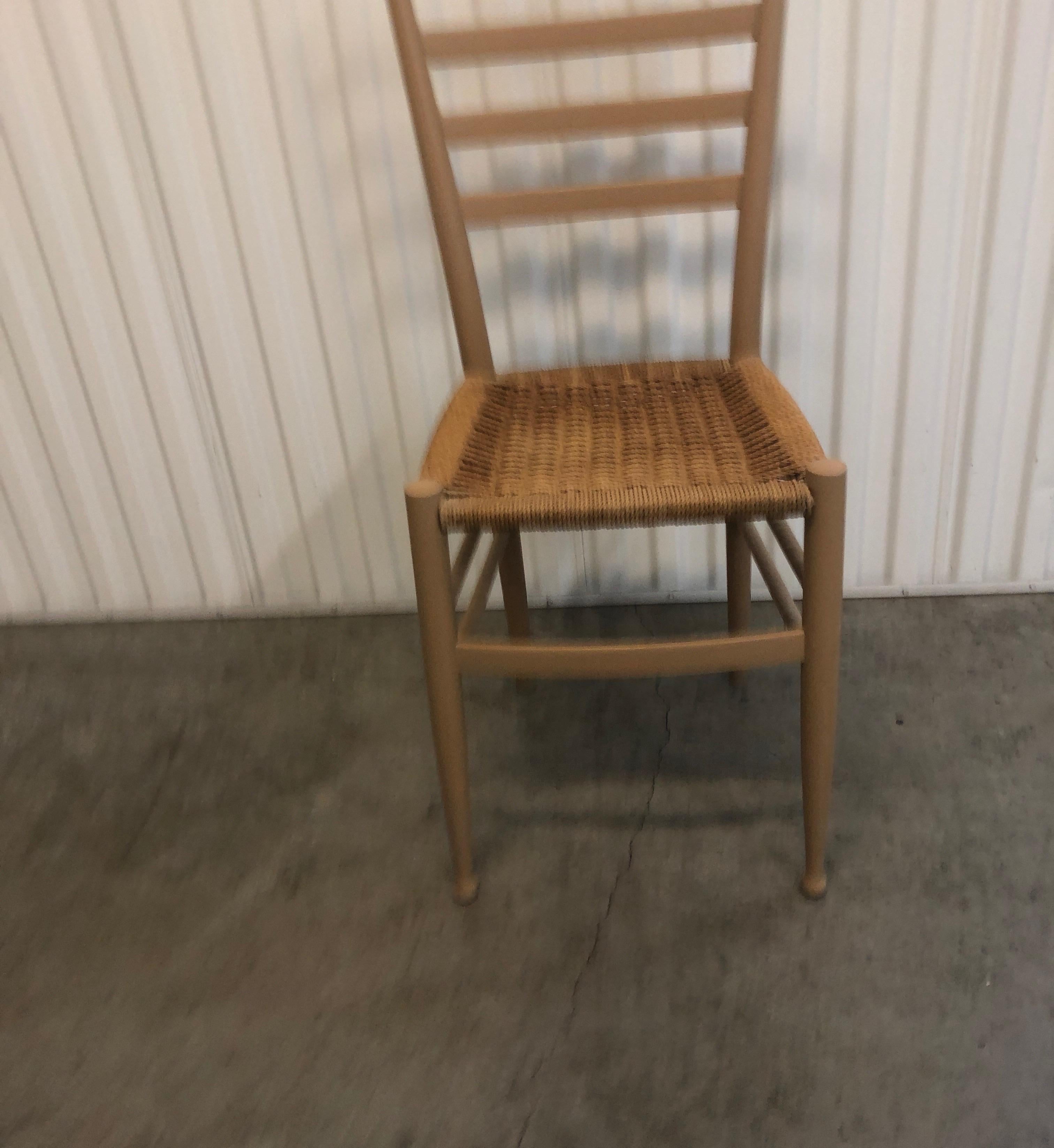 Italian painted side chair with woven seat and ladder back.
aka Rush Seat.
Size: 15 W x 13.5 SD x 18.5 SH x 36.5 BH.