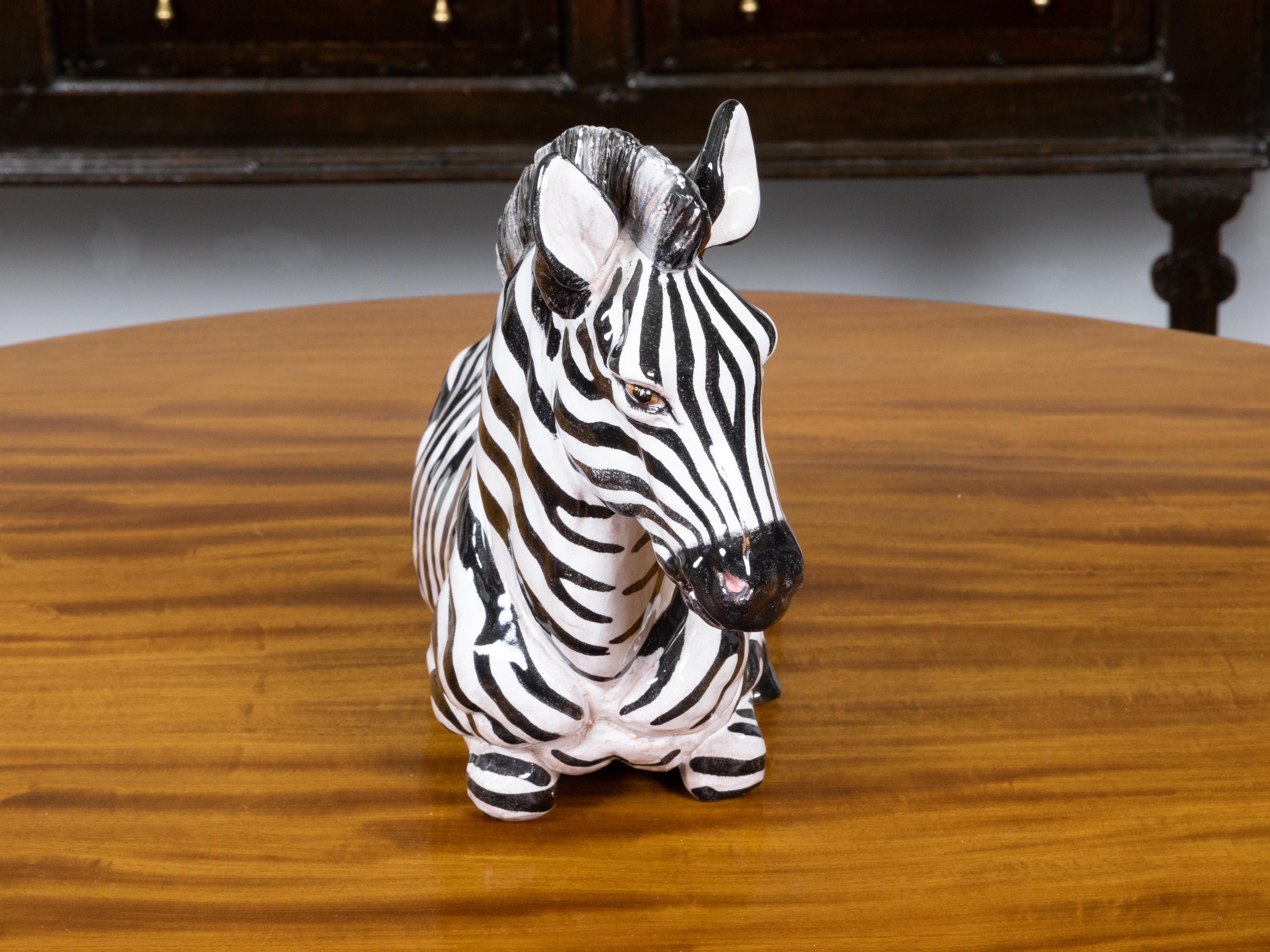 Hand-Painted Italian Painted Terracotta Statue of a Brown Eyed Zebra Resting on the Ground For Sale