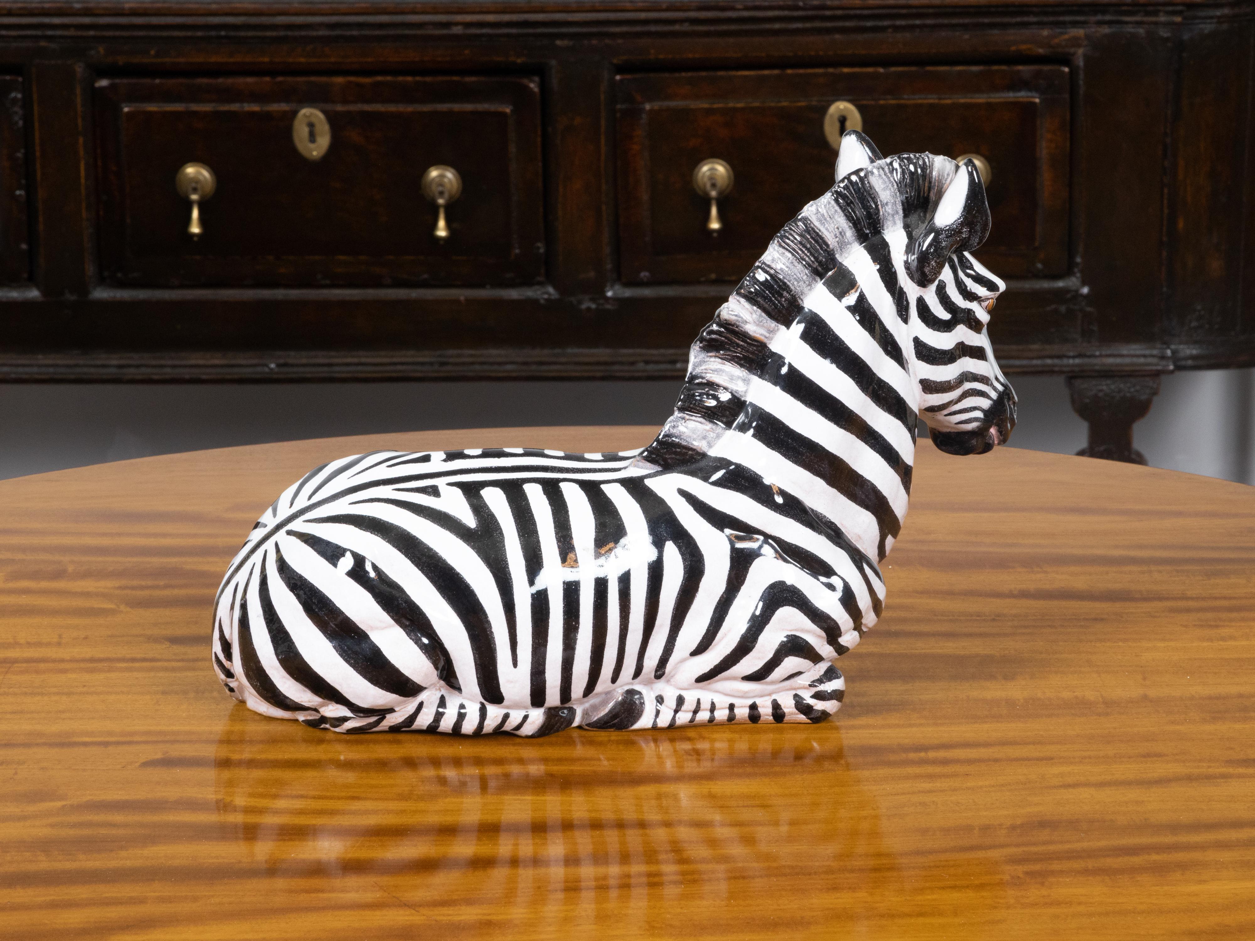 Italian Painted Terracotta Statue of a Brown Eyed Zebra Resting on the Ground In Good Condition For Sale In Atlanta, GA