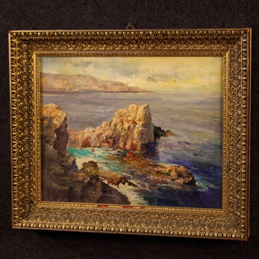 Italian painting oil on canvas from 20th century. Work signed lower left depicting seascape with cliffs. Painting of excellent pictorial quality, for collectors and antique dealers. Frame carved and gilded in wood and plaster, with some small lacks