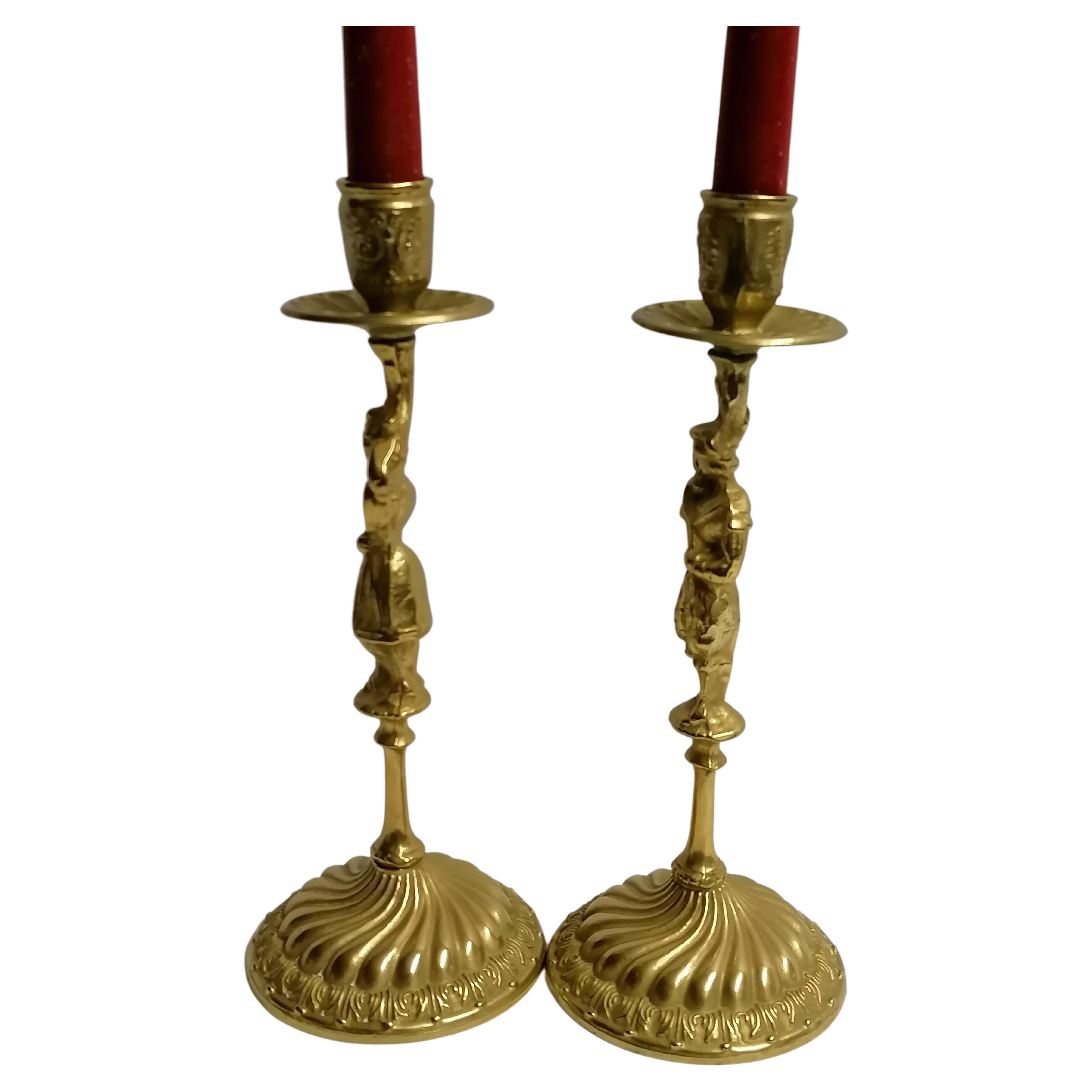 Italian decorative couple of candle holder figurine a man and a woman in solid brass candlestick, in good condition 
The item have been polished, they are ready to be used, would look great in any room 
Dimensions: 25 cm H x 10 cm x 10 cm 
Weight: