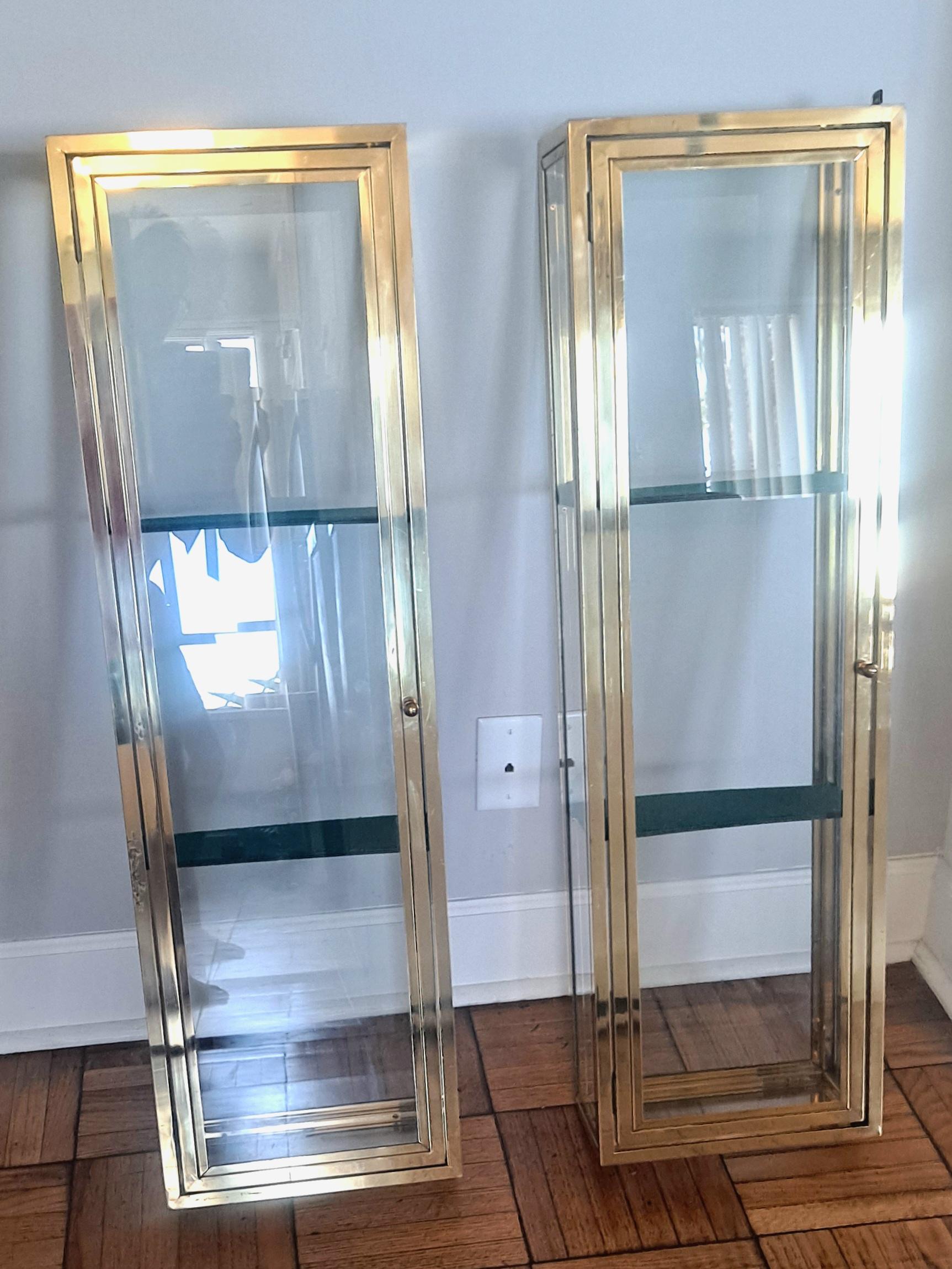 Pair of jewelry vitrine .The vitrine mounts on the side and could mount on the back. The hanging bracket are on the side as showing  on the photos .
Vitrines are  in vintage condition there are some scratches but mostly on the side.
