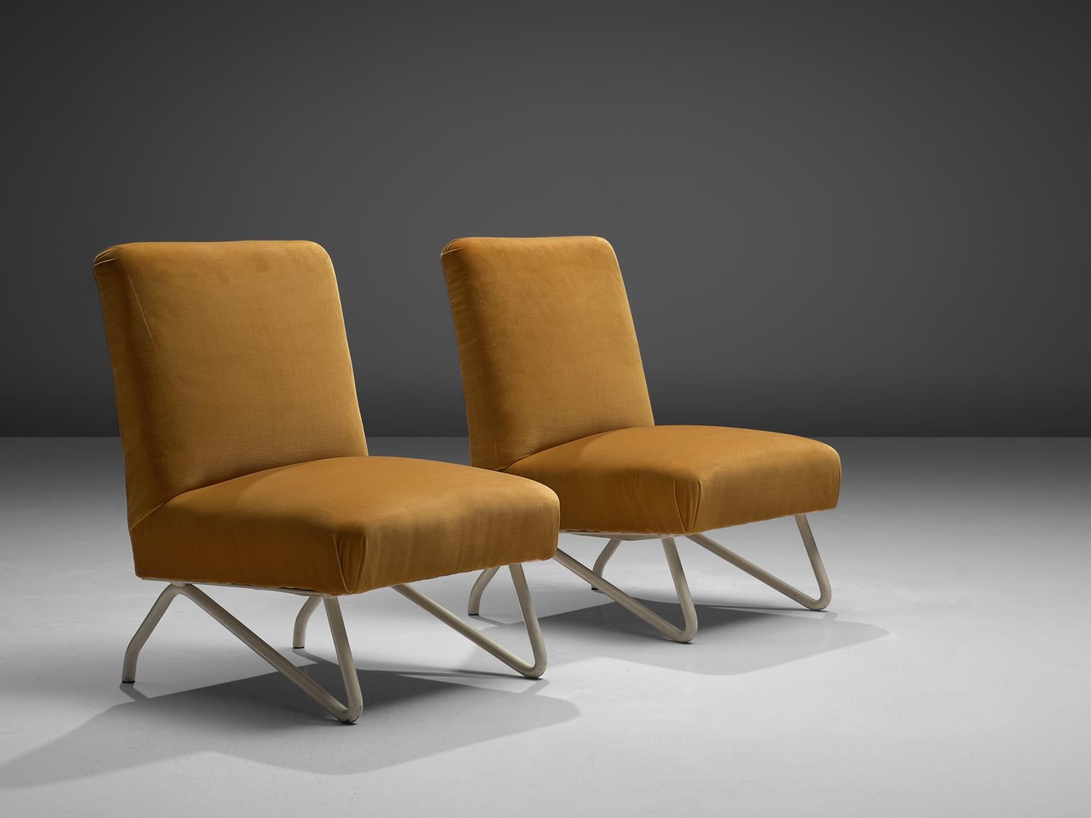 Set of 2 easy chairs, velvet, metal, Italy, 1960s

The design of these Italian lounge chairs is basic and well proportioned. The straight lines of the seat and back combine well with the playful tubular white metal frame. 

The original