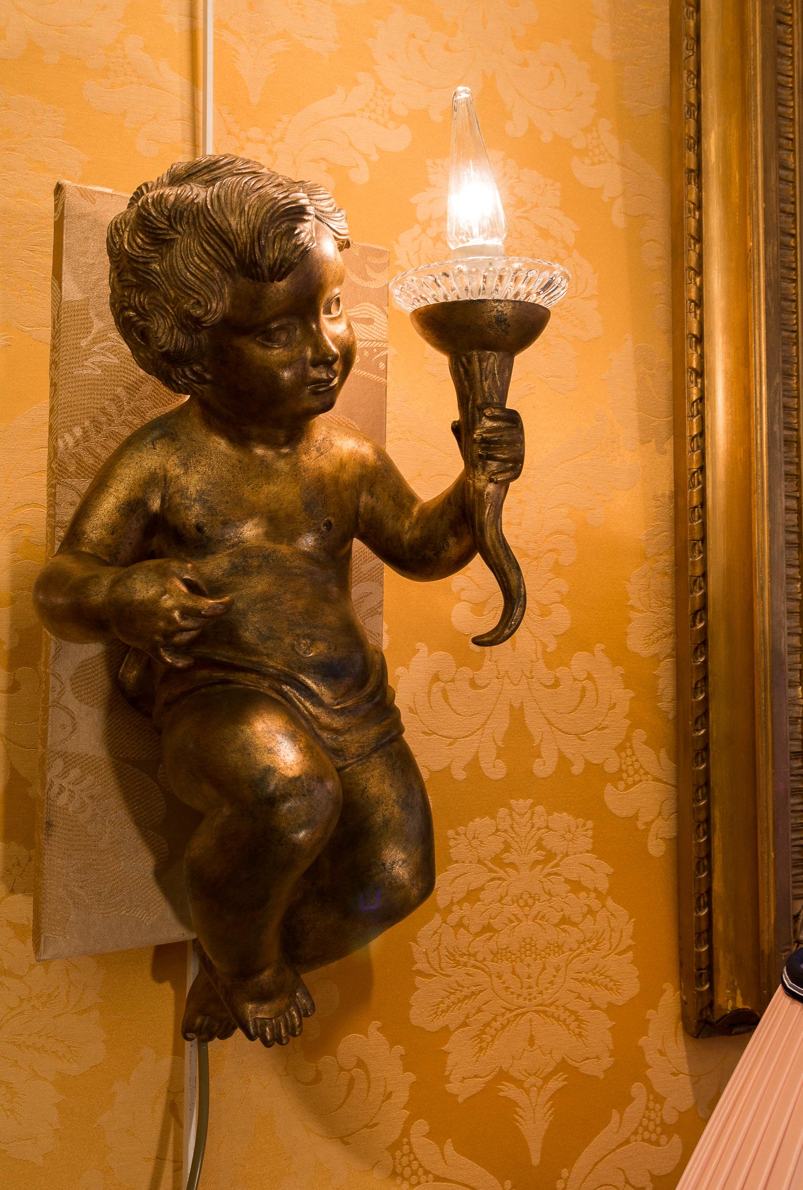 Carved Italian Pair of Louis XV Style Figural Putti Sconces For Sale
