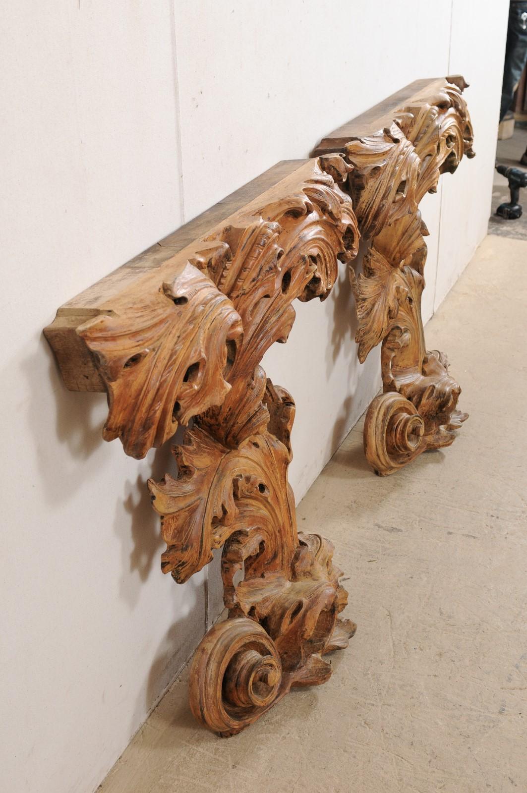 Italian Pair Of Ornately Carved Scrolling Acanthus Leaf Skinny Italian Pair Of Ornately Carved Scrolling Acanthus Leaf Skinny