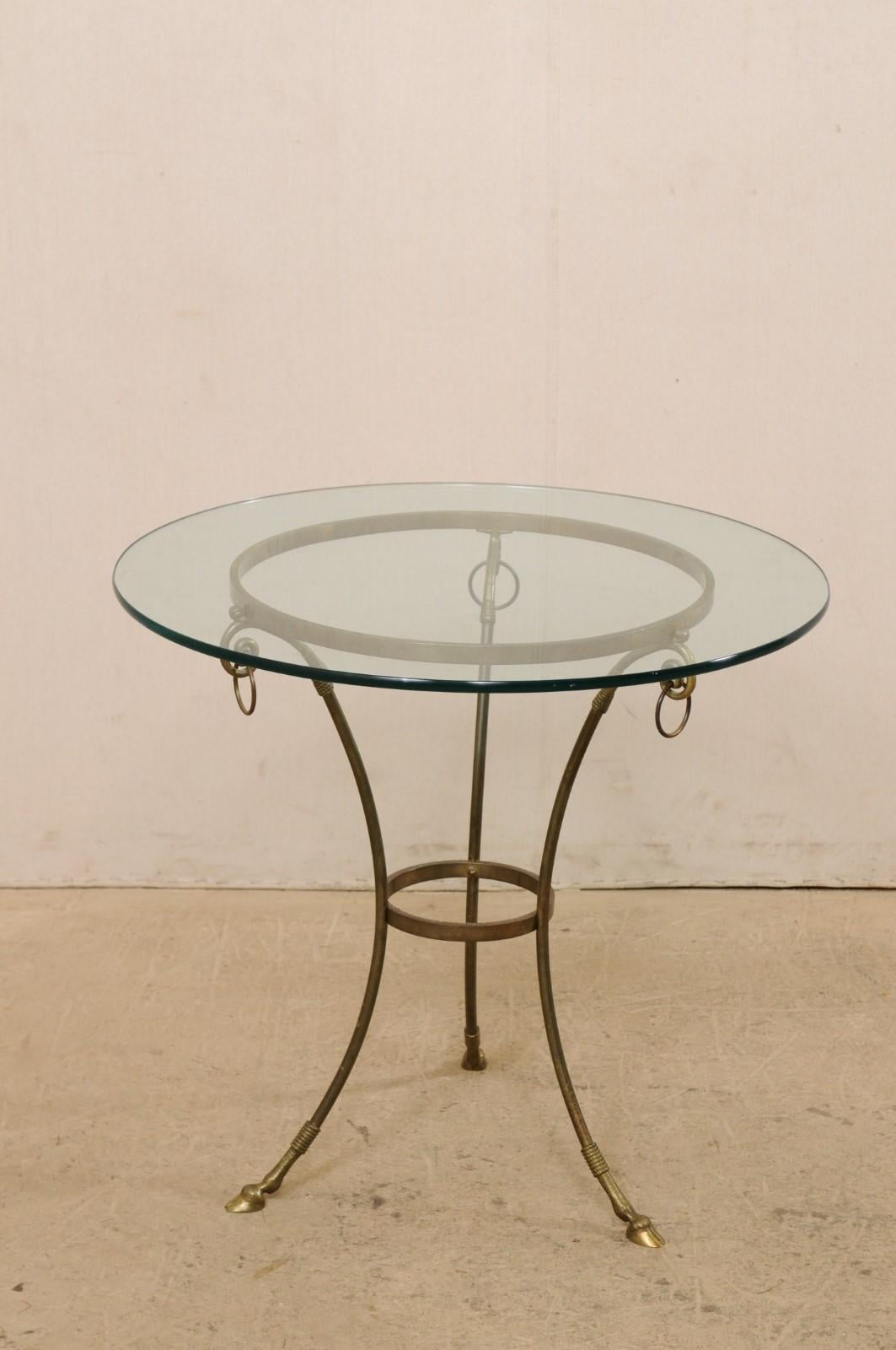 Italian Pair of Round Brass Tables with Hooved Feet and Glass Tops In Good Condition For Sale In Atlanta, GA