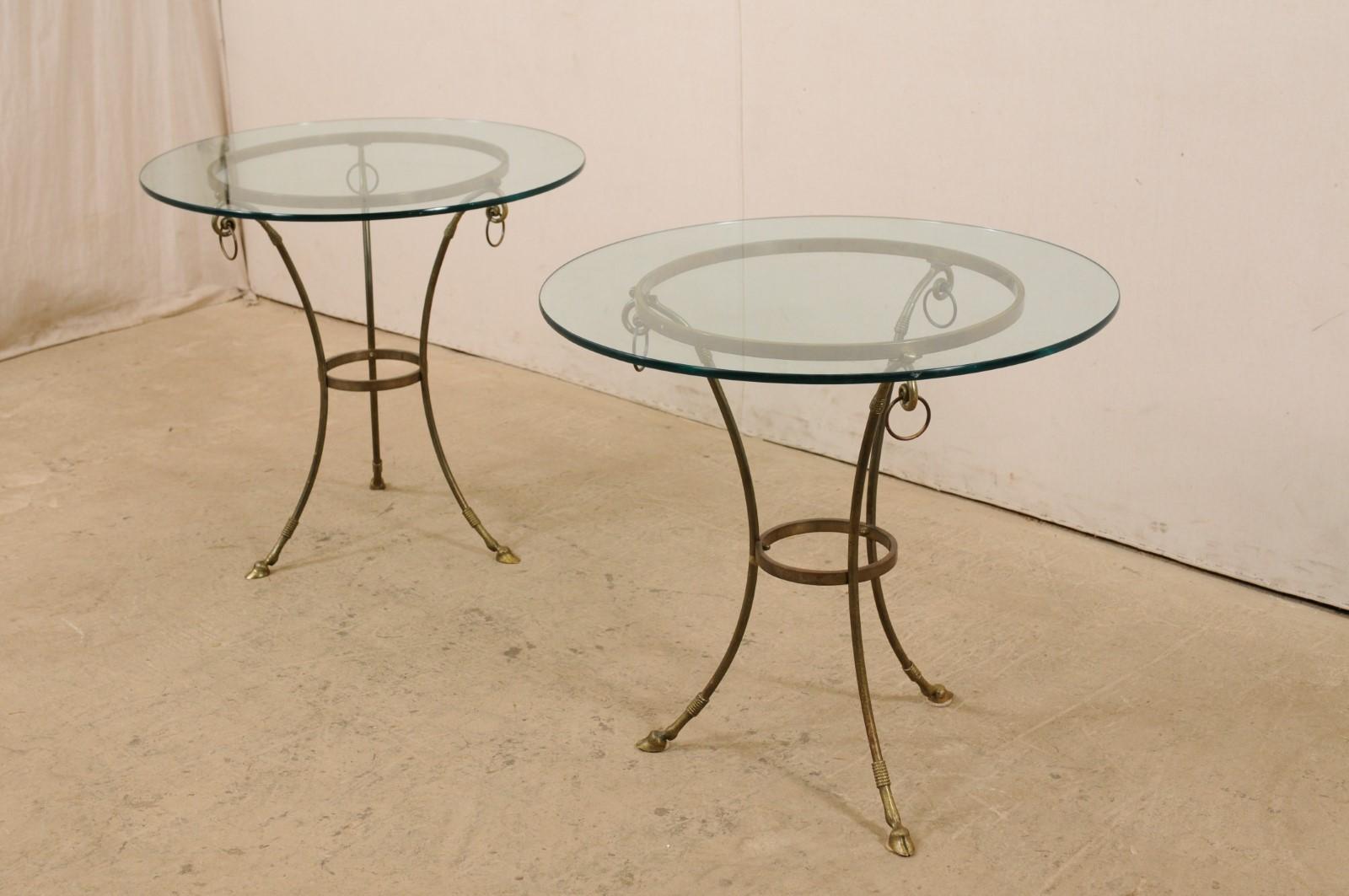 Metal Italian Pair of Round Brass Tables with Hooved Feet and Glass Tops For Sale