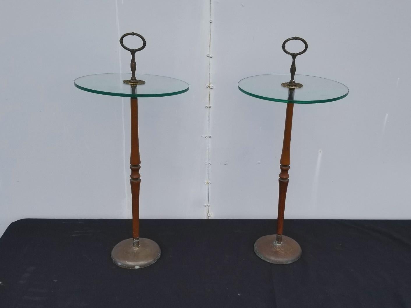 1950s pair of Italian side tables, glass top on the wood and brass base. Tables are in original condition.
Tables can be dismantle for easy shipping.