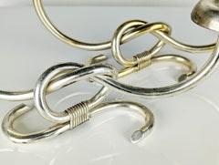 Italian pair of silver plated/anodized aluminum 2-candle candlesticks