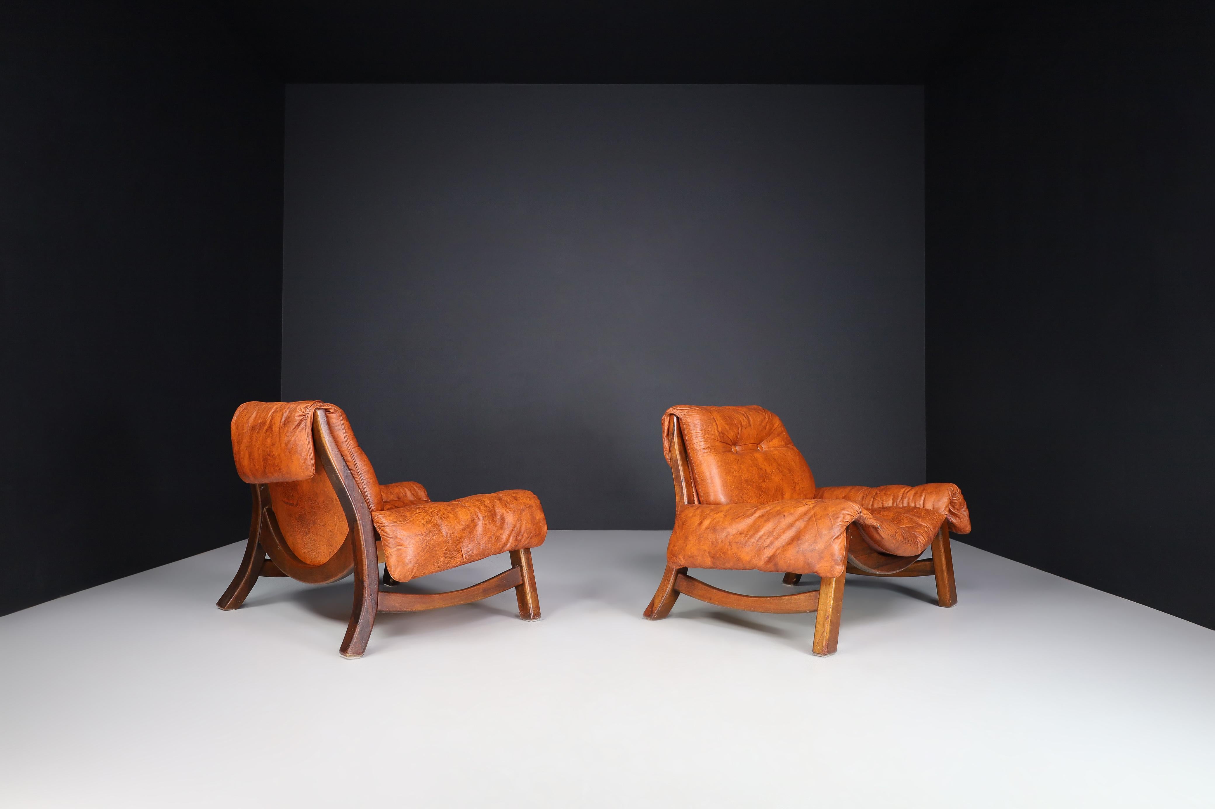 Italian pair of two Lounge chairs in fine leather and Walnut Wood, Italy 1970s   1