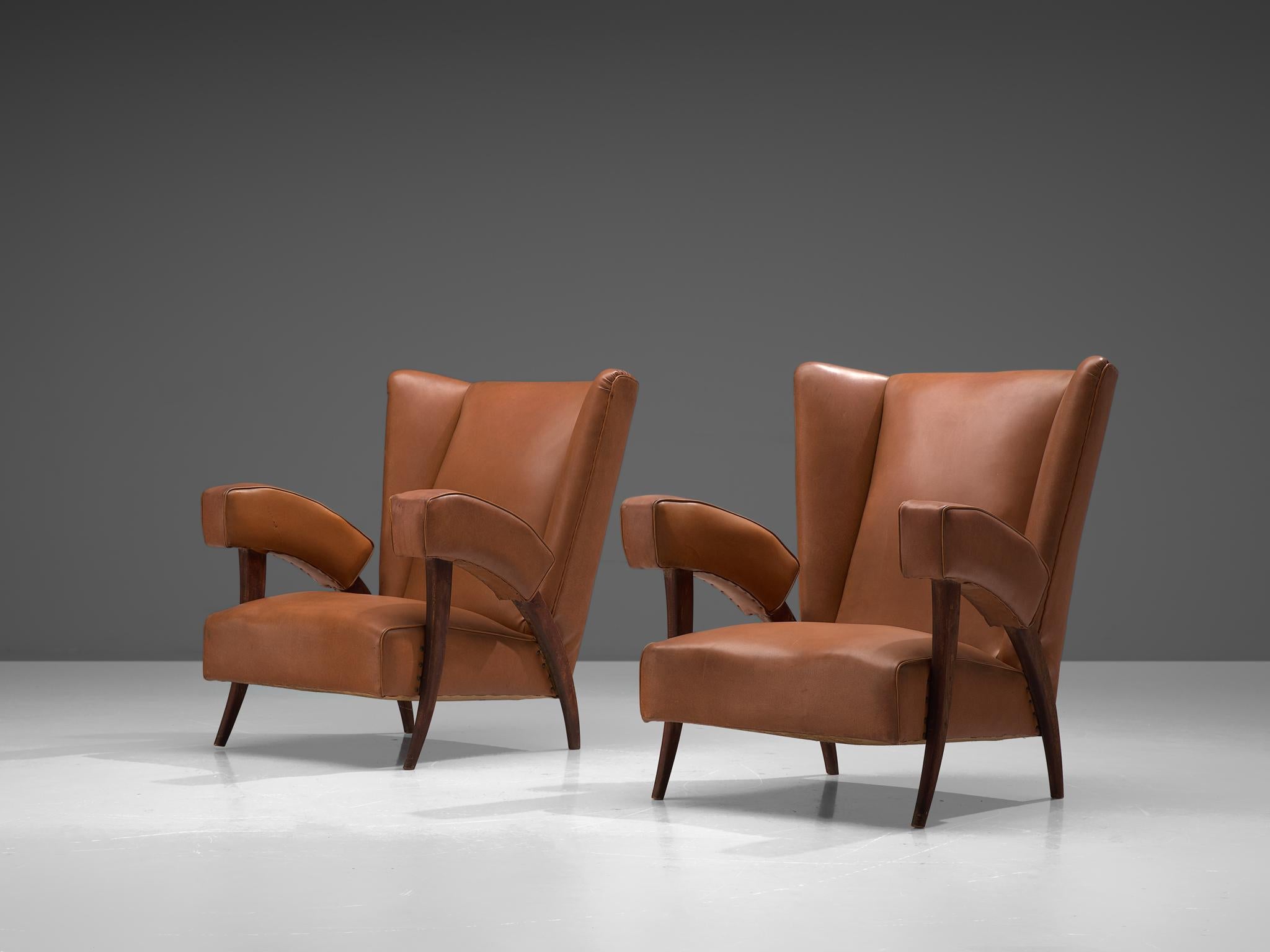 Mid-Century Modern Italian Pair of Wingback Chairs with Characteristic Armrests