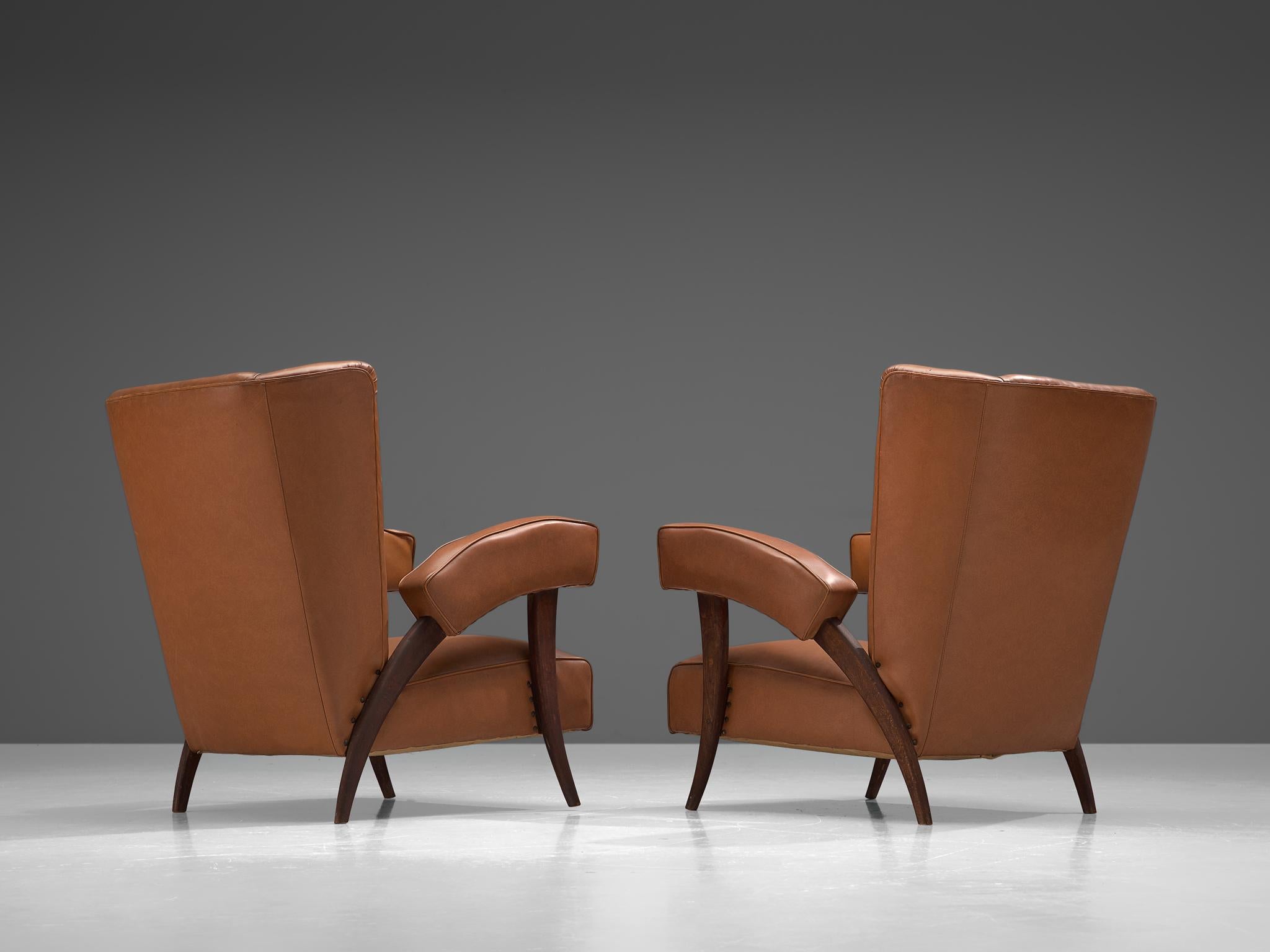 Mid-20th Century Italian Pair of Wingback Chairs with Characteristic Armrests