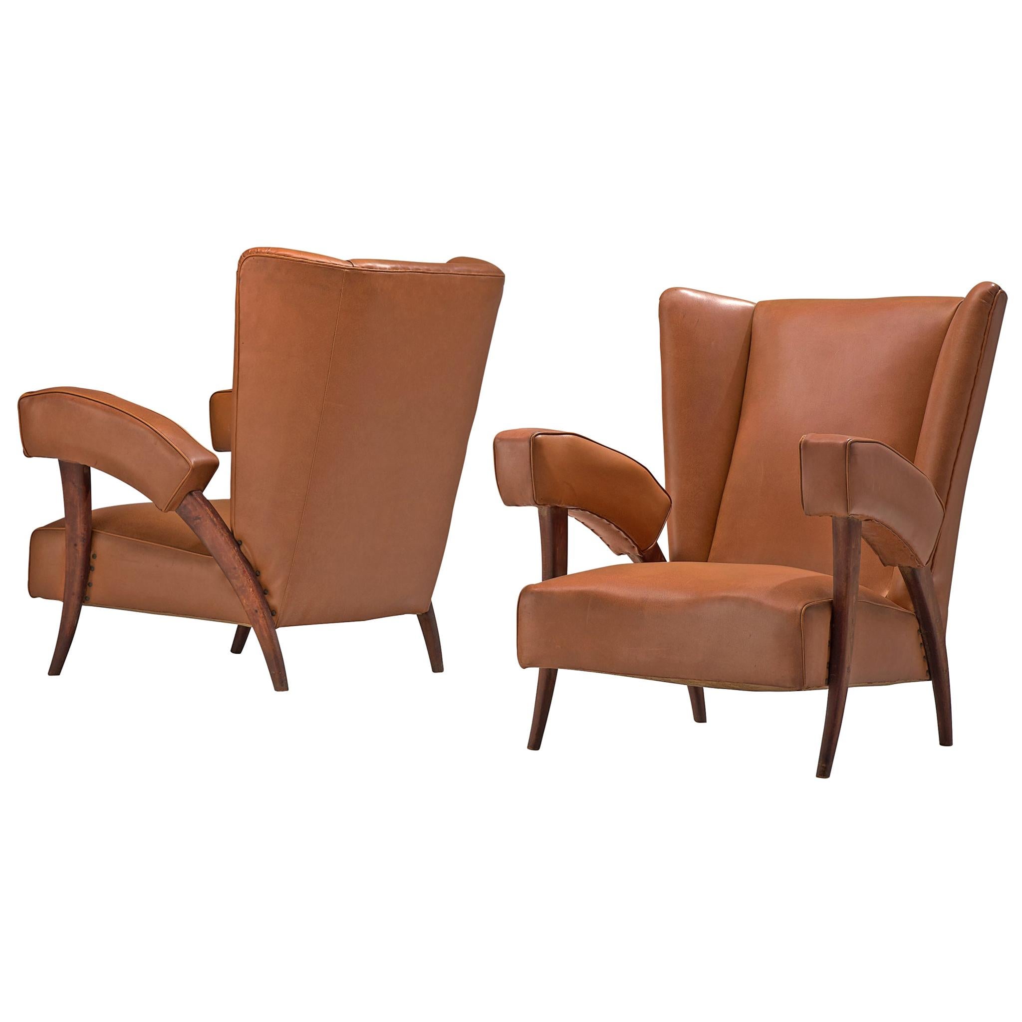 Italian Pair of Wingback Chairs with Characteristic Armrests