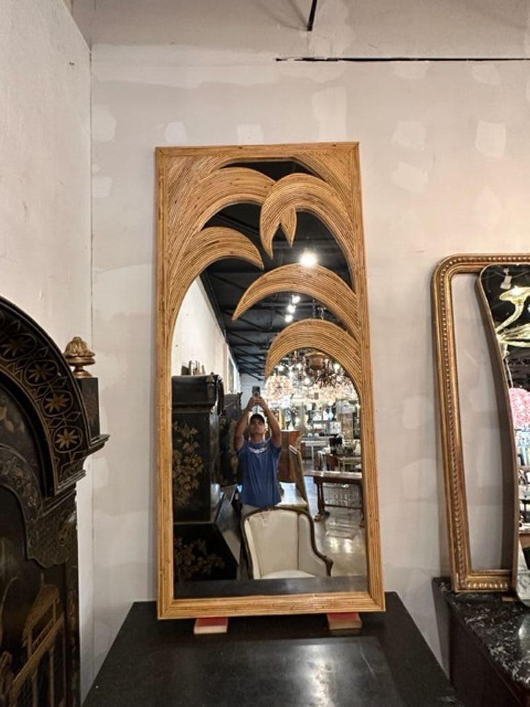 Stylish palm design bamboo mirrors from Italy. Adds an interesting touch to your decor! Note: There are 4 available. Priced separately.