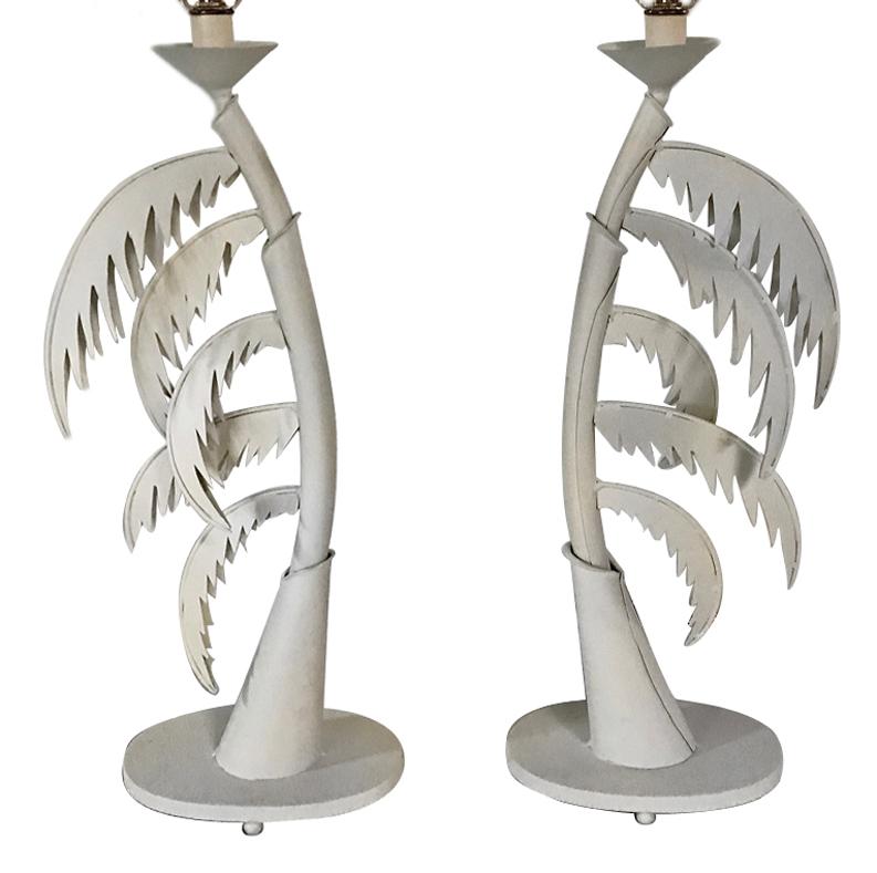 Pair of circa 1960's Italian palm-shaped painted tole table lamps.

Measurements:
Height of body: 22