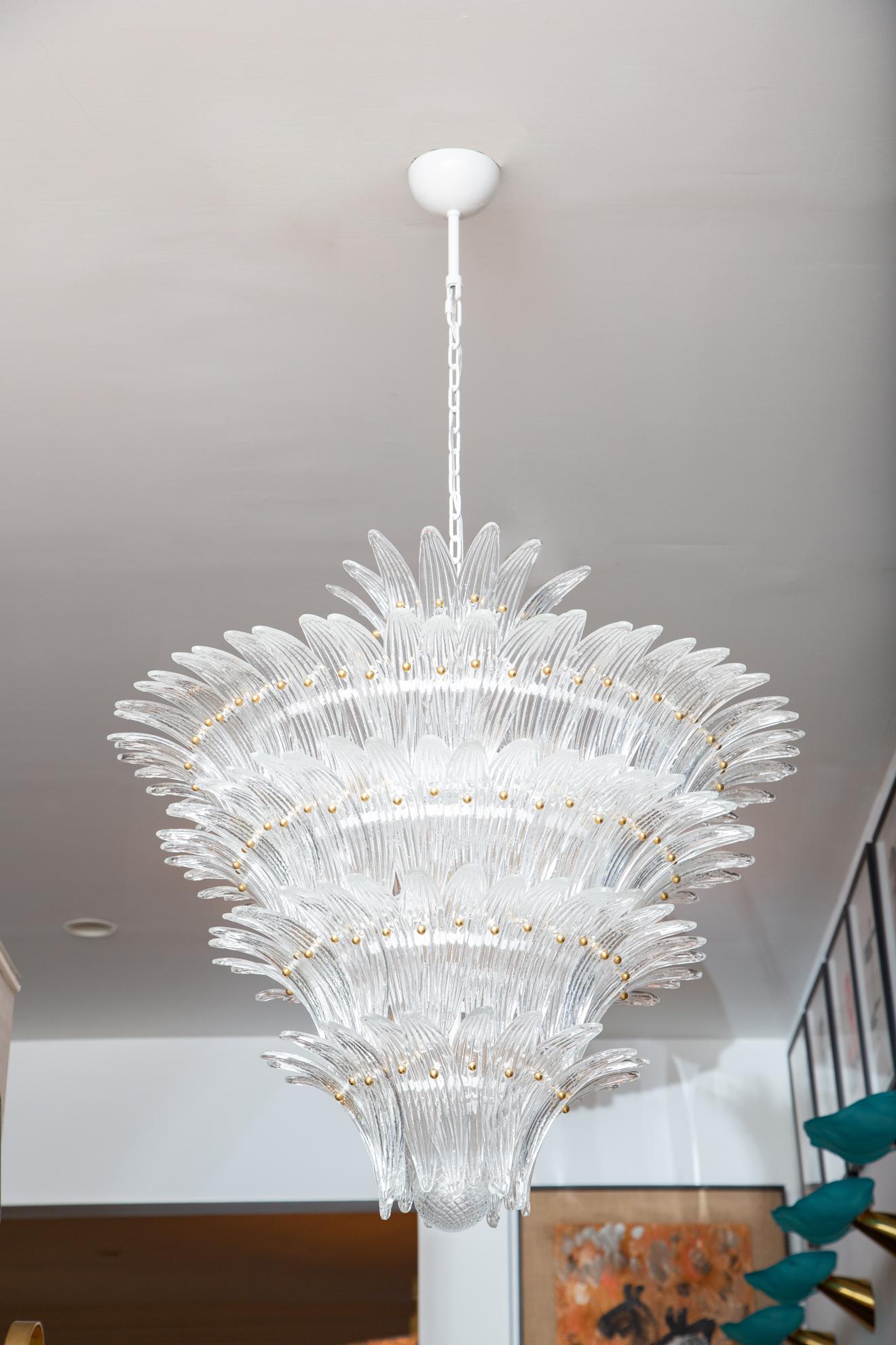 Italian palmette chandelier Murano glass leaves, in stock
Gracious Murano clear textured glass chandelier.
Five tiers 