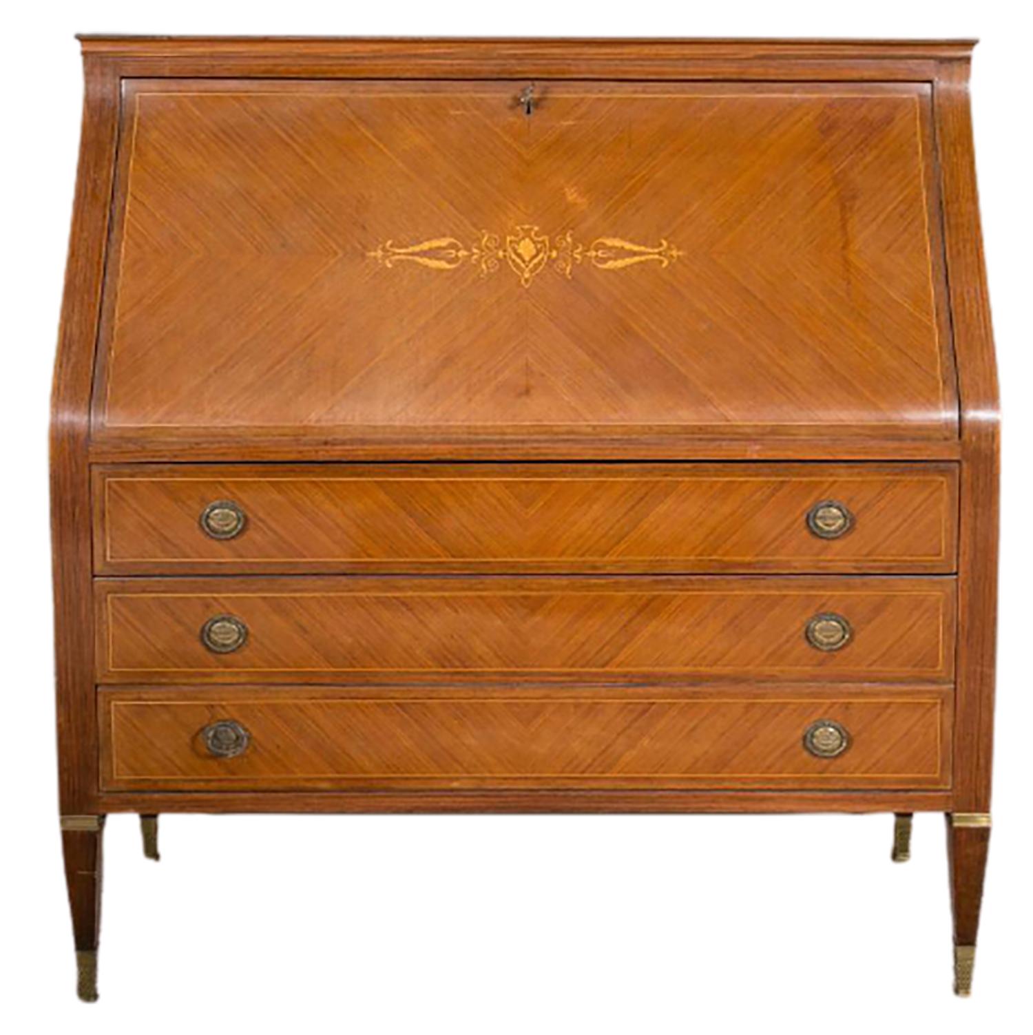 Italian Paolo Buffa style inlaid slant front desk with fitted desk/vanity interior. The tapering and sleek lines make this stylish and exquisite desk a must have for any home or office. The lower half having three drawers while the top half having a