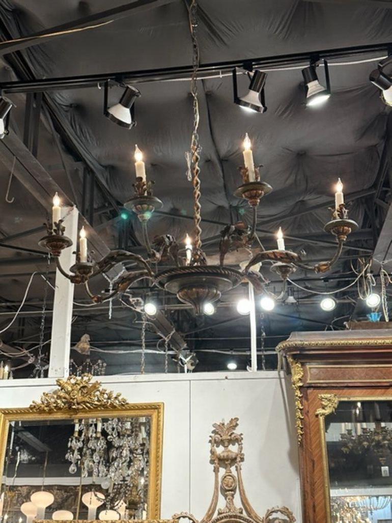 19th century Italian parcel gilt steel 7-light chandelier. Circa 1890. The chandelier has been professionally rewired, comes with matching chain and canopy. It is ready to hang!