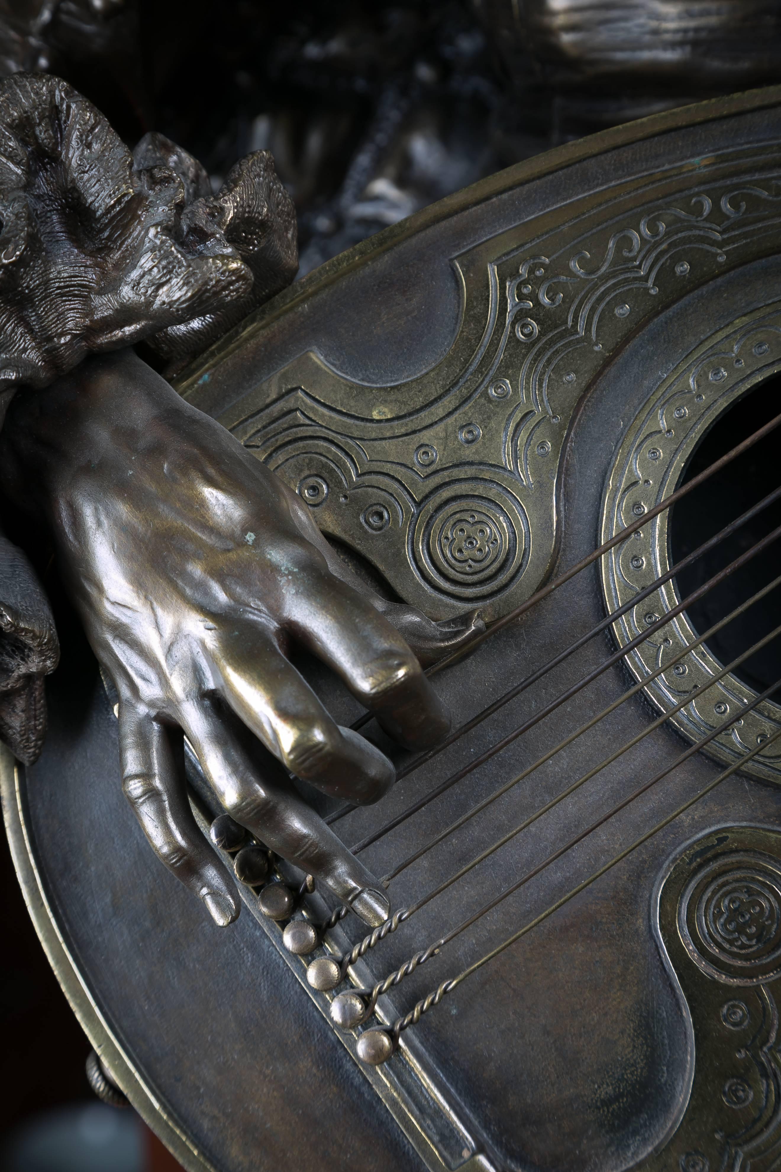 Italian parcel-gilt bronze figure of a lute player. Signed A. Pandiani and stamped A. Pandiani Milano.