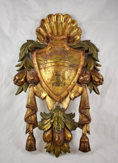 Italian Parcel-Gilt & Painted Armorial Tassel & Fruit Wall Plaque, Castle & Sun