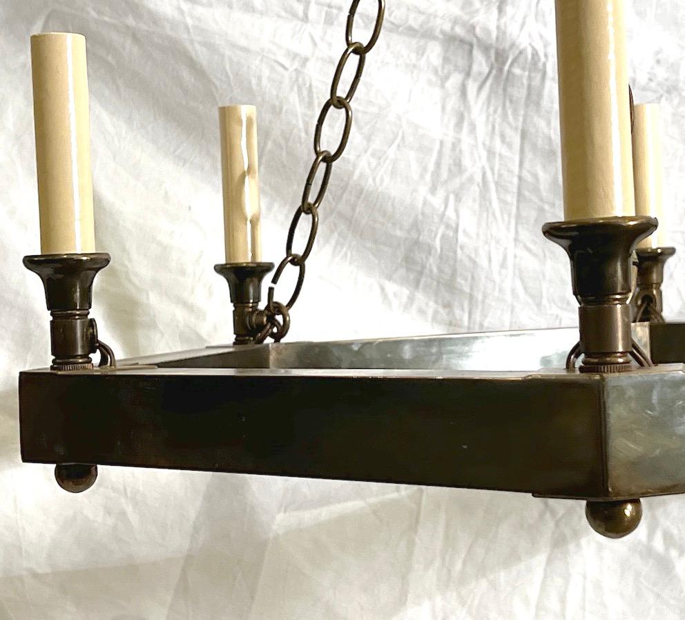 A circa 1960s Italian patinated bronze chandelier with 6 lights.

Measurements:
Drop: 20