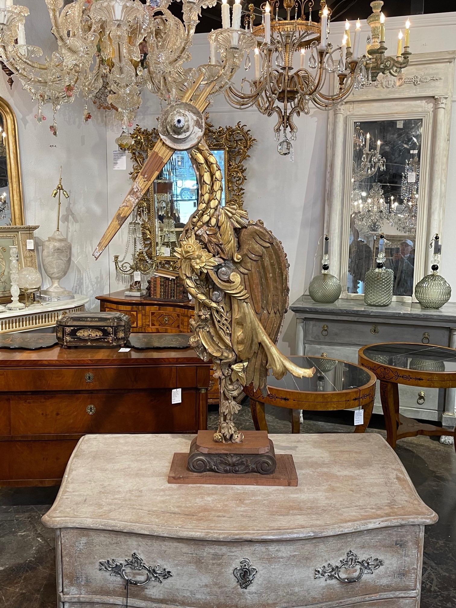Large scale Italian pelican sculpture made from wood fragments from the 18th and 19th century. Such an interesting piece! A true work of art!