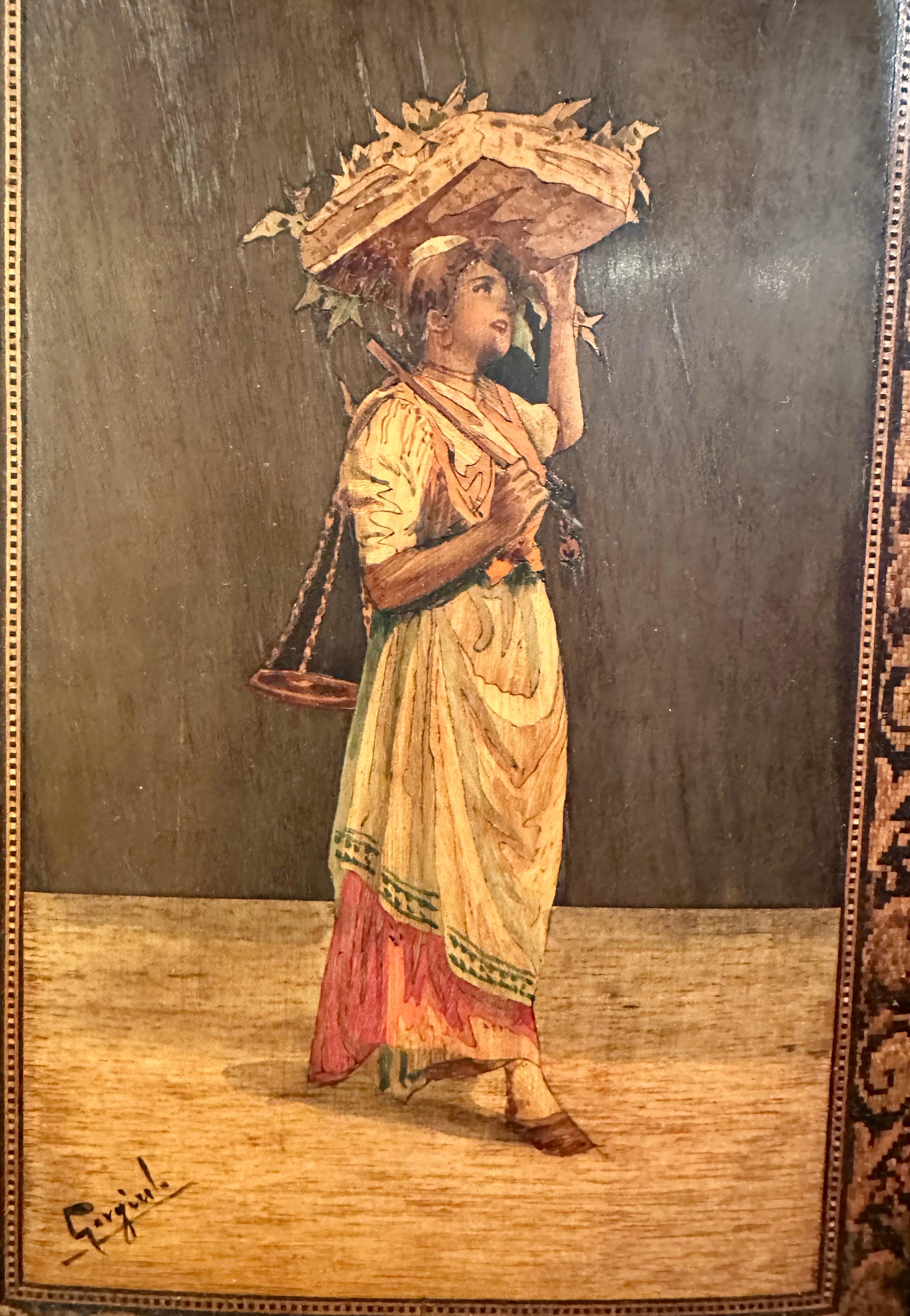 Plaque italienne de la fin du XIXe siècle en marqueterie de bois de plume, d'intarsia, d'ébène et de bois fruitier teinté
Signé  GARGIULO, (Sorrente Italie 1843-1912).

  Dimensions avec le cadre : 12 pouces de haut x 8.7 pouces de large