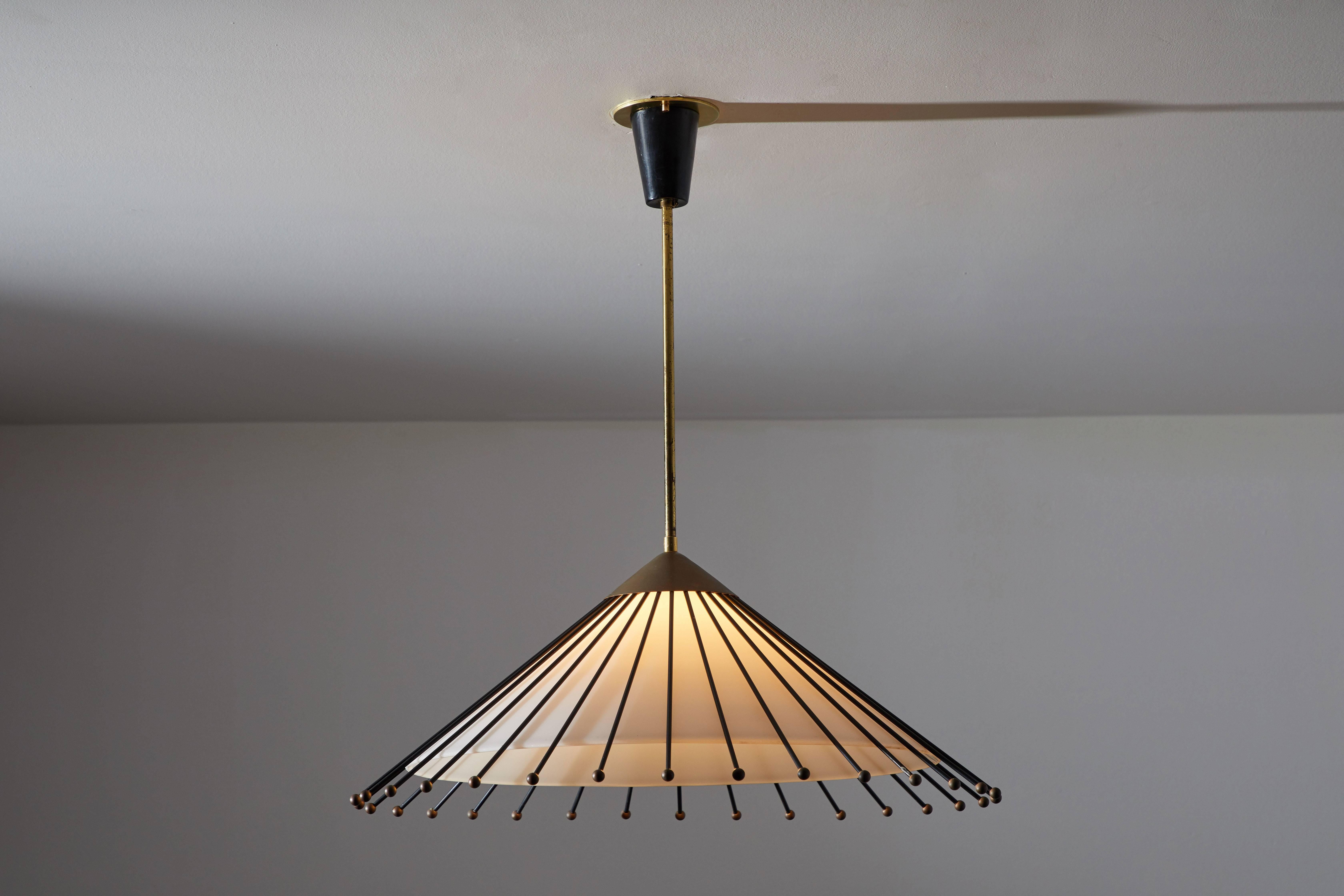 Italian pendant attributed to Arredoluce. Manufactured in Italy circa 1960s. Painted metal, opaline glass, brass. Wired for US junction boxes. Takes one E27 100w maximum bulb.
