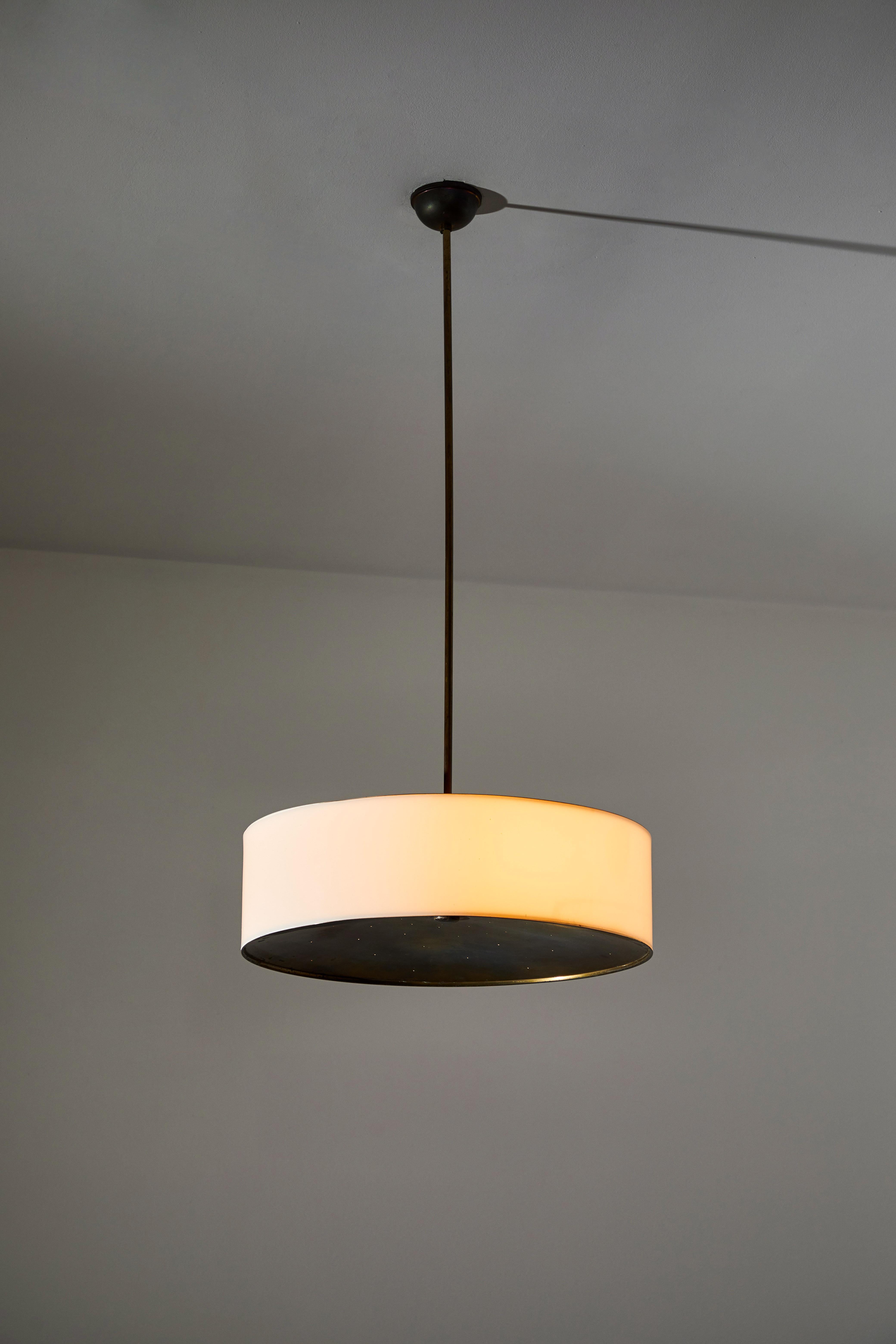 Italian pendant by Bucci. Designed and manufactured in Italy, circa 1950s. Acrylic, perforated brass. Original canopy. Rewired for U.S. Standards. We recommend three E27 60w maximum bulbs. Bulbs provided as a one time courtesy.