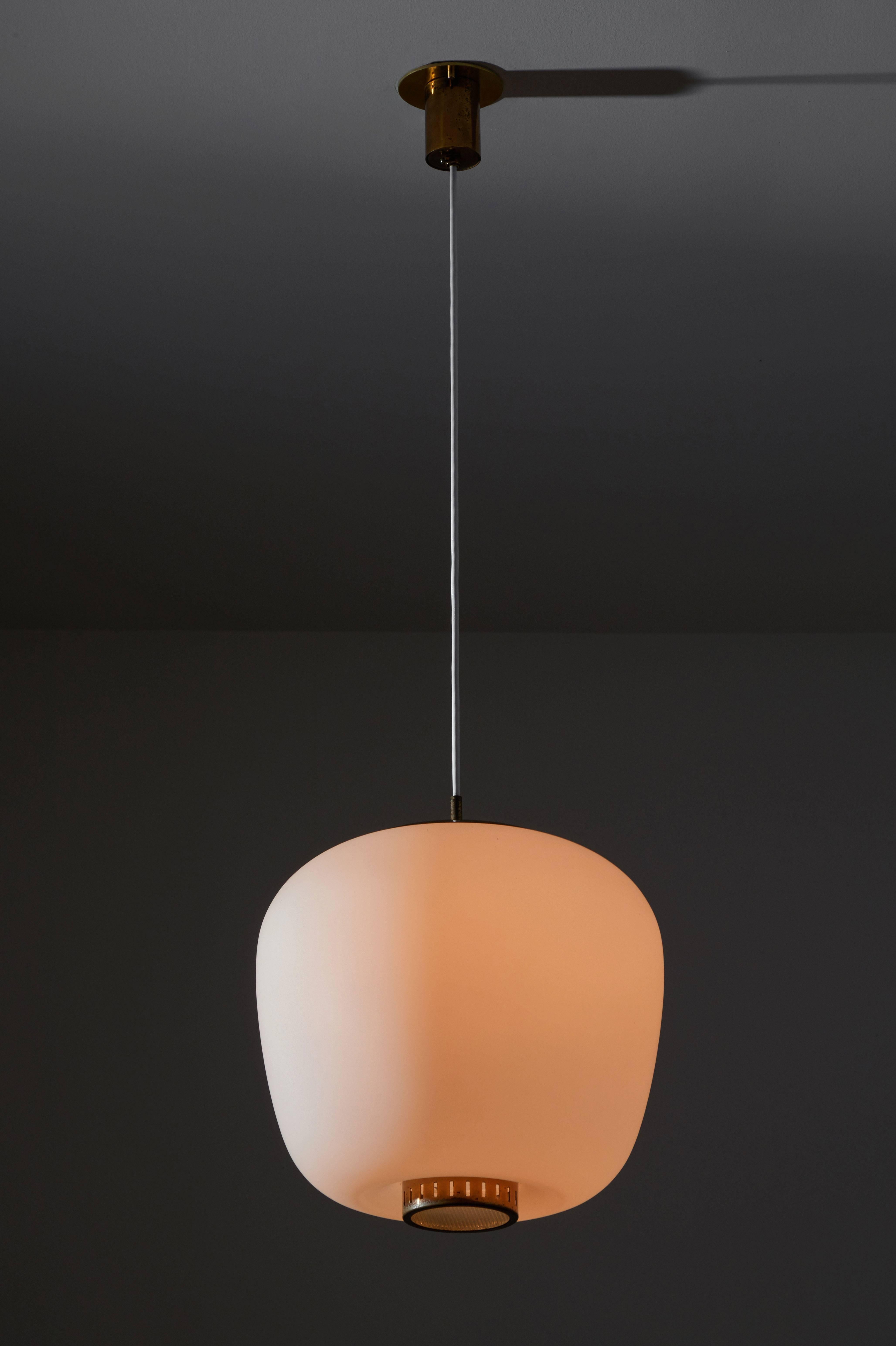 Pendant by Stilnovo designed and manufactured in Italy, circa 1960s. Brushed satin glass diffuser and brass hardware. Custom brass ceiling plate. Rewired for US junction boxes. Takes one E27 100w maximum bulb.